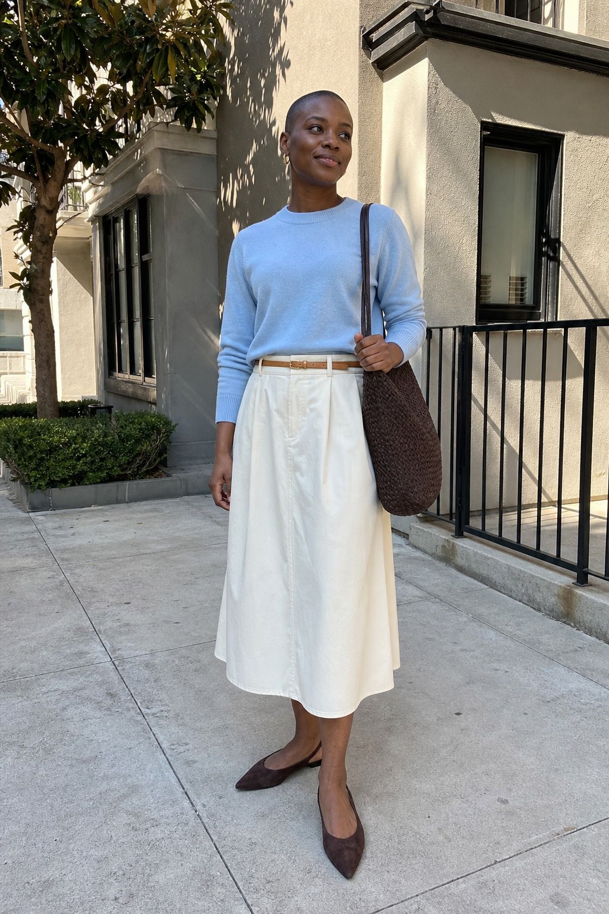 Woman wearing a lightweight crewneck sweater