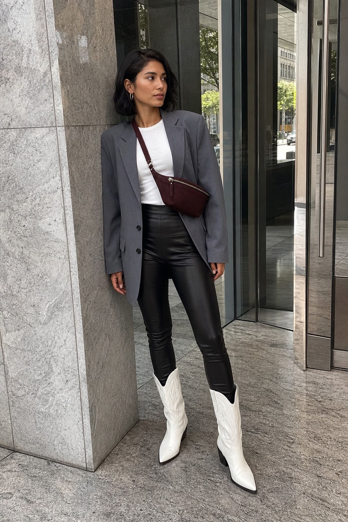 Faux Leather Leggings With an Oversized Blazer and Cowboy Boots for cowboy boots outfits for fall.
