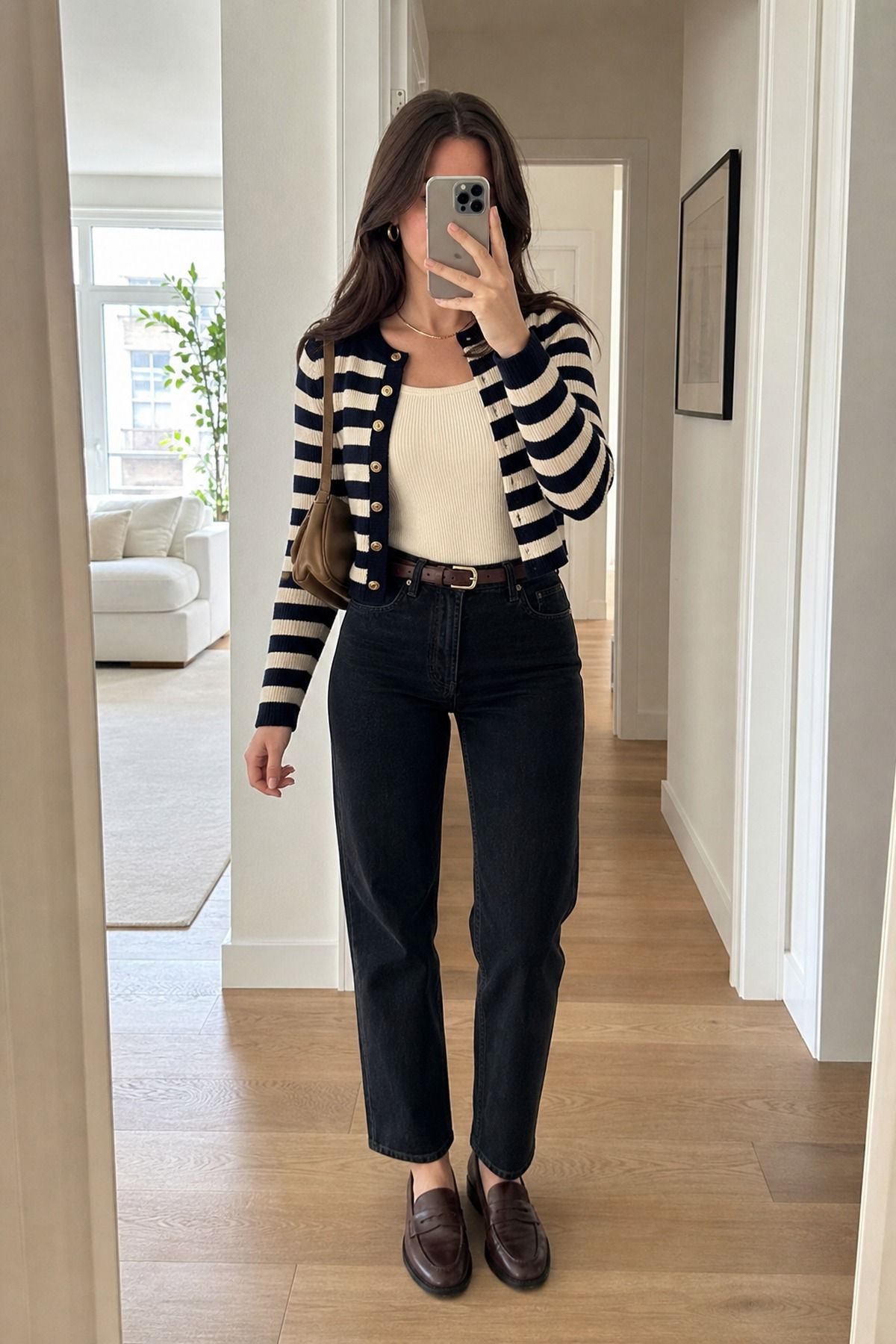 Woman wearing a make the waistline look intentional