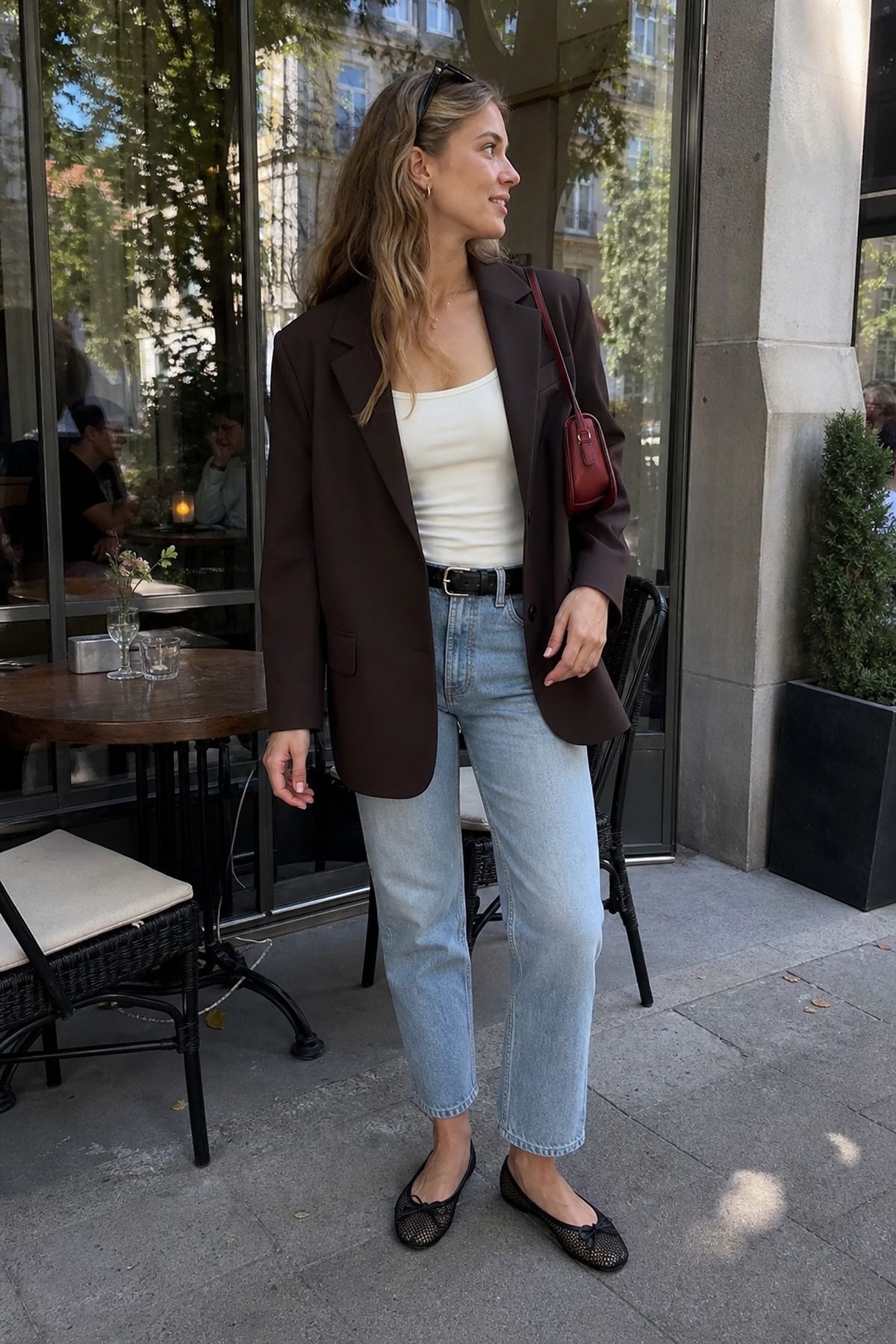 Woman wearing a blazer over a mesh ballet flat outfit, a spring date night outfit