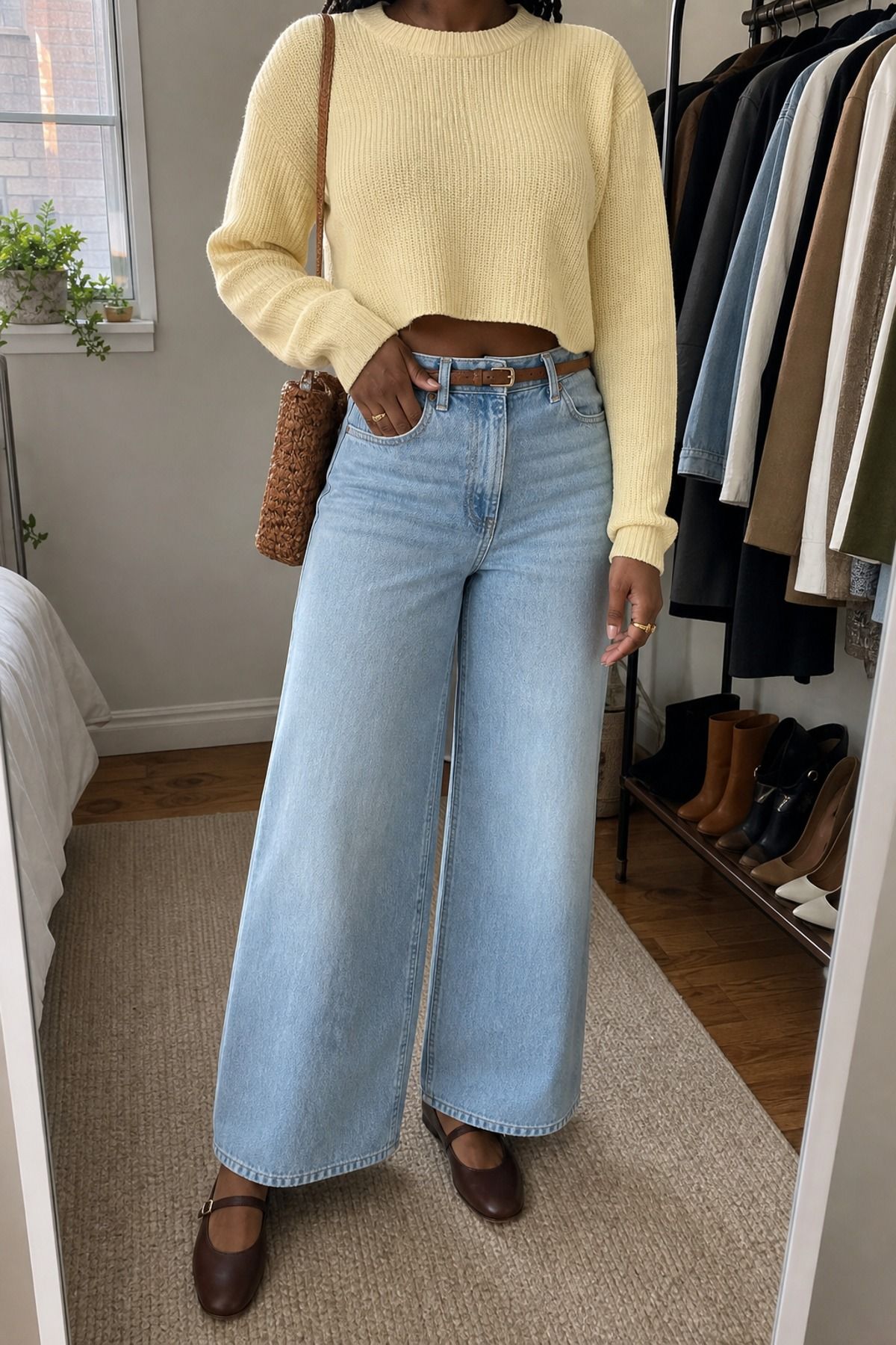 Woman wearing a cropped cotton sweater with high-rise wide-leg