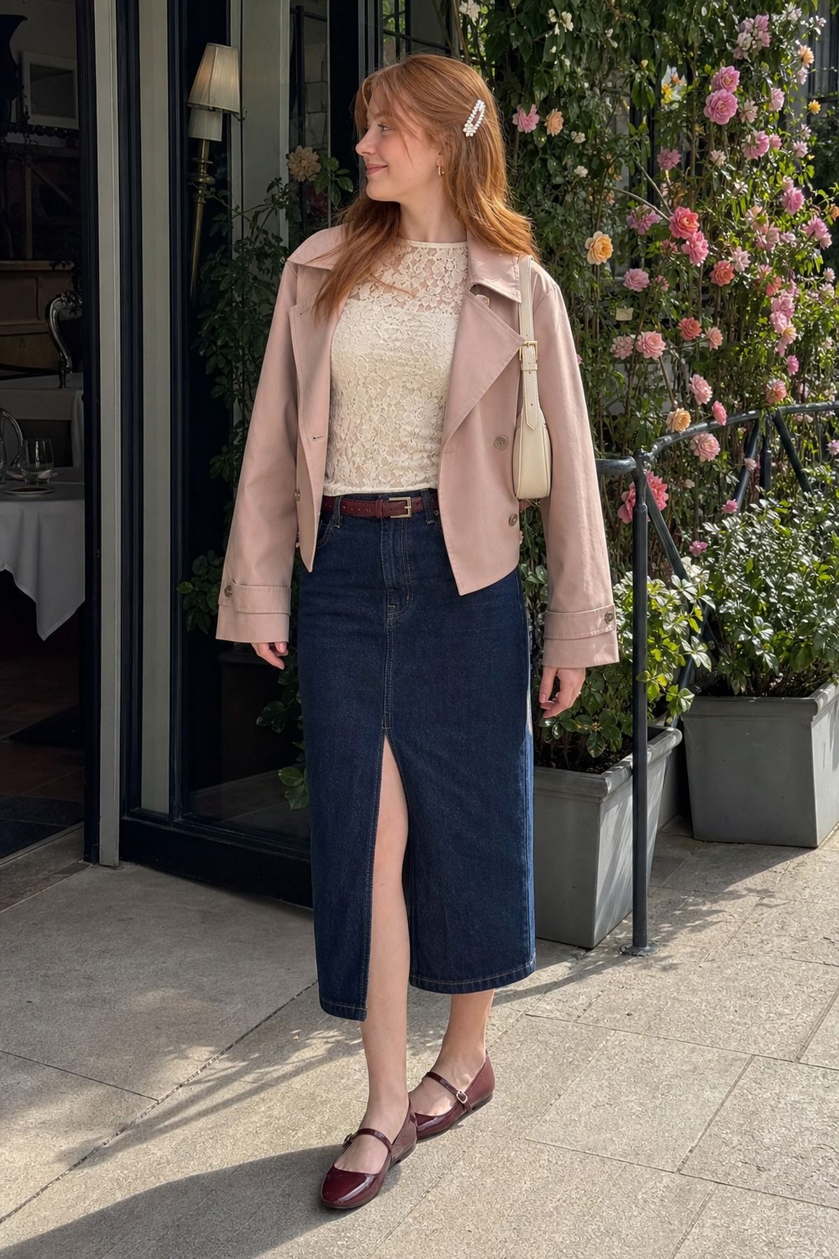 Woman wearing a denim skirt with a lace blouse, a spring dinner outfit