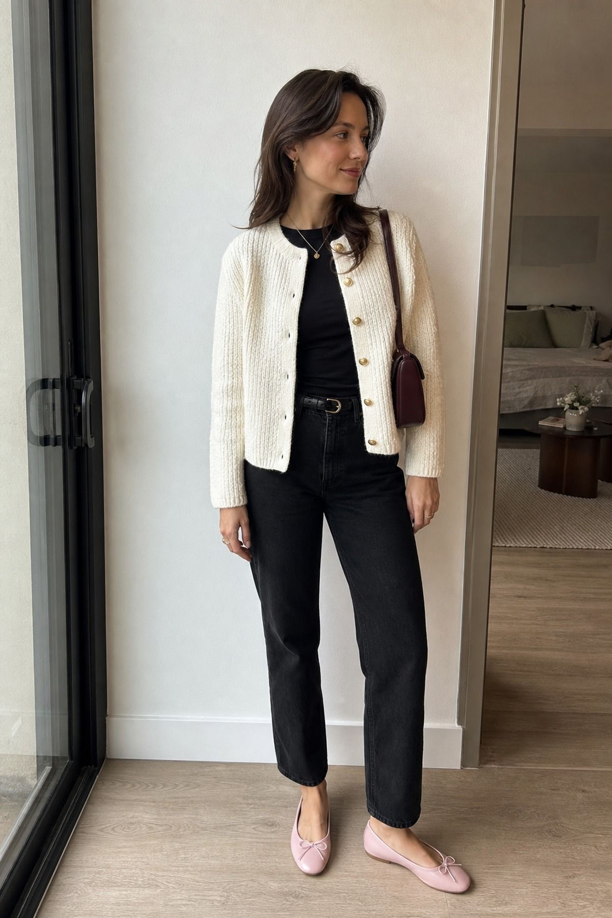 Woman wearing a cardigan jacket with dark jeans and ballet flats, a spring jacket outfit