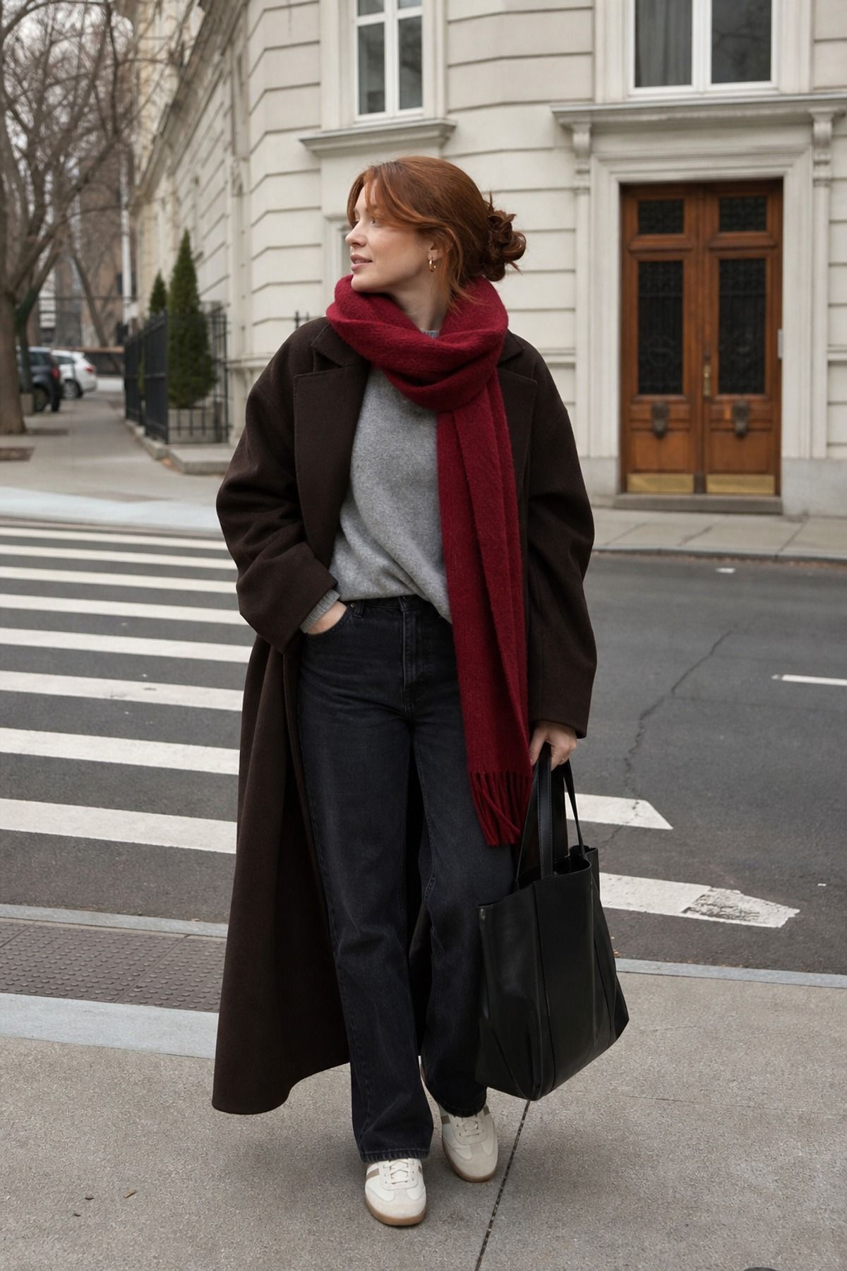 Woman wearing a sweatshirt with a maxi coat, a cozy winter outfit