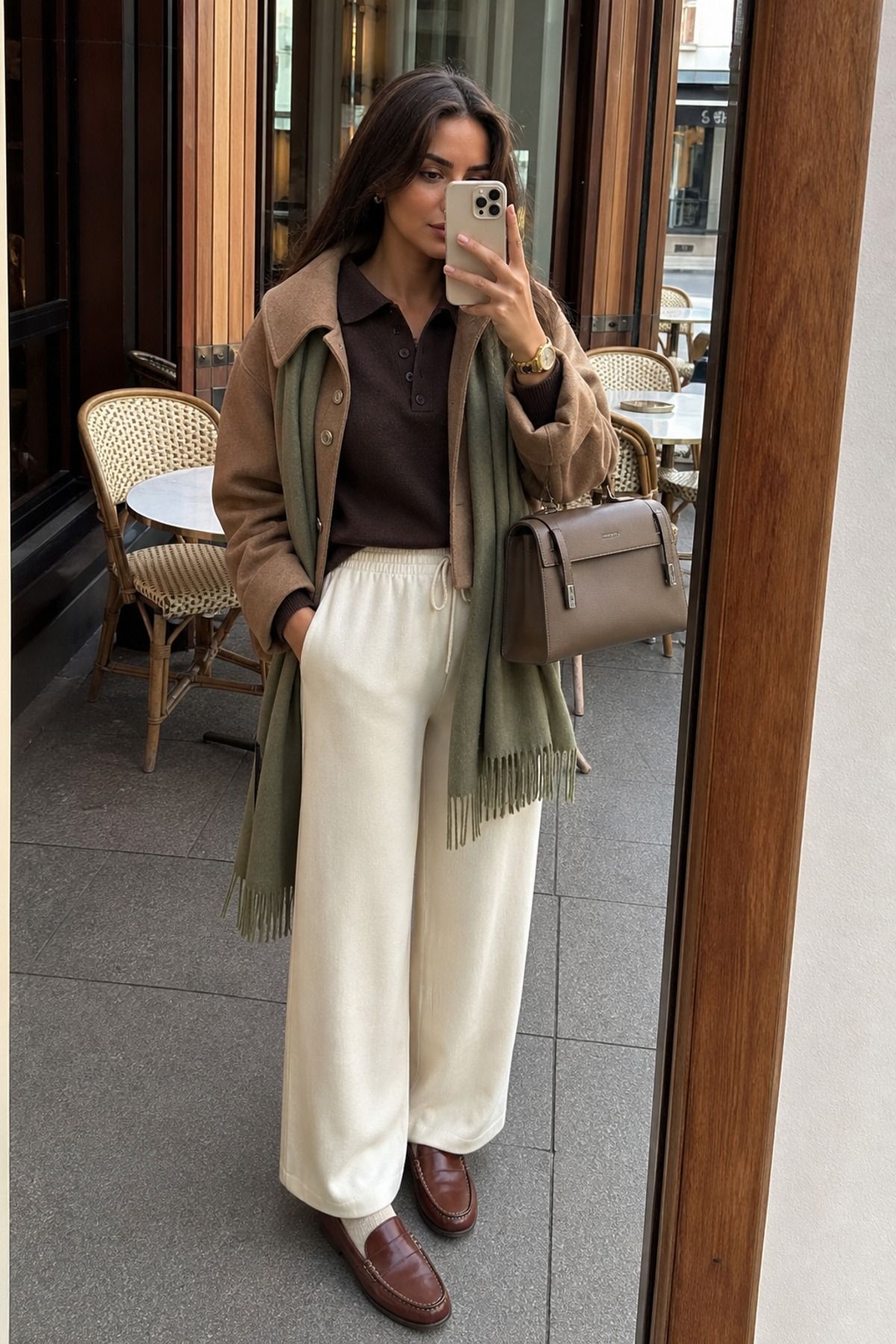 Woman wearing a knit polo with pull-on pants, a cozy winter outfit