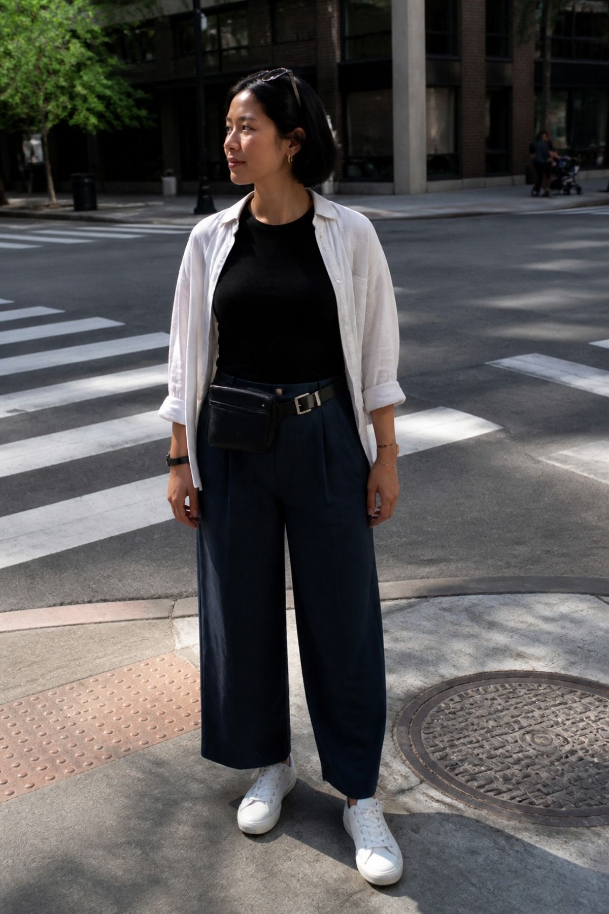 Woman wearing wide-leg pants with a fitted tee, an errand outfit