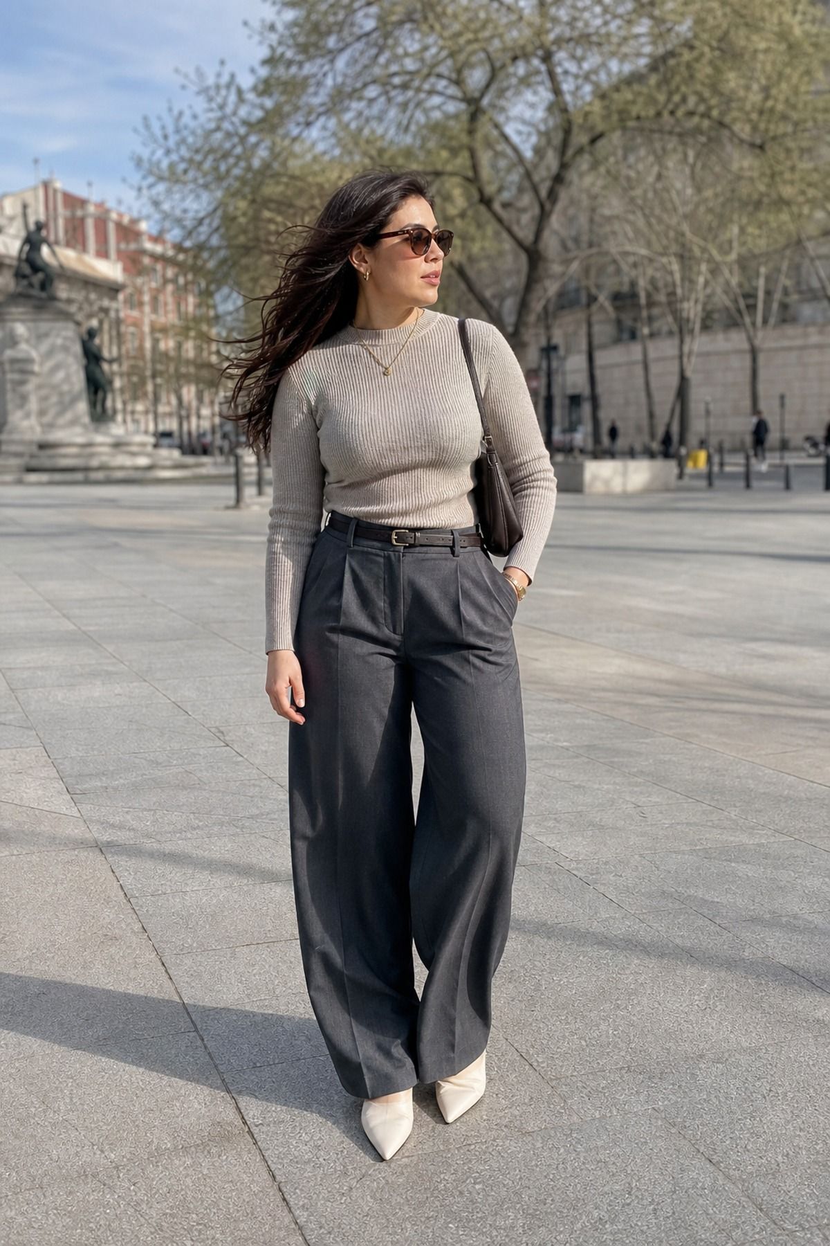 Woman wearing wide-leg pants with a fitted sweater, a windy day outfit