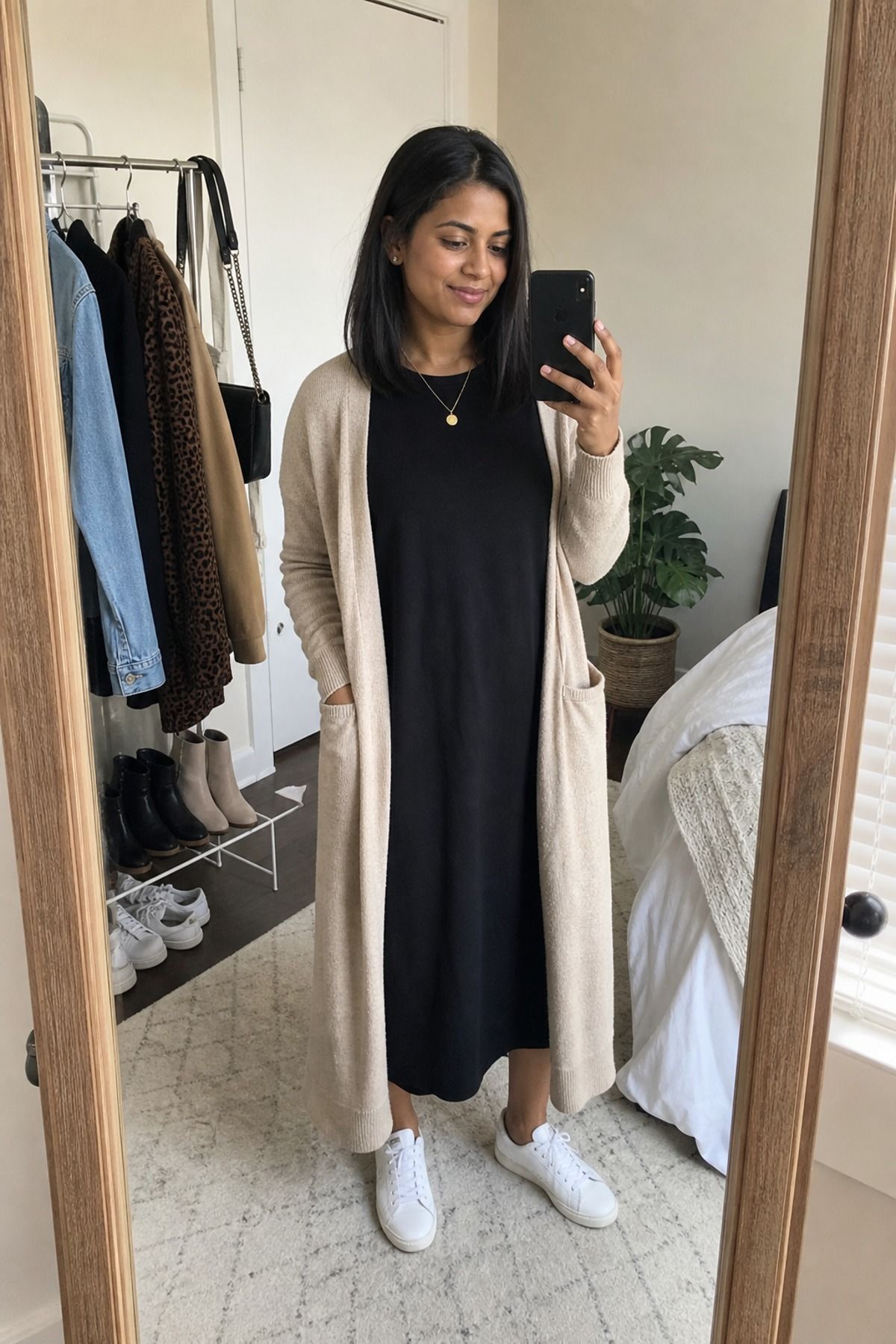 Woman wearing a t-shirt dress with a long cardigan, a work from home outfit