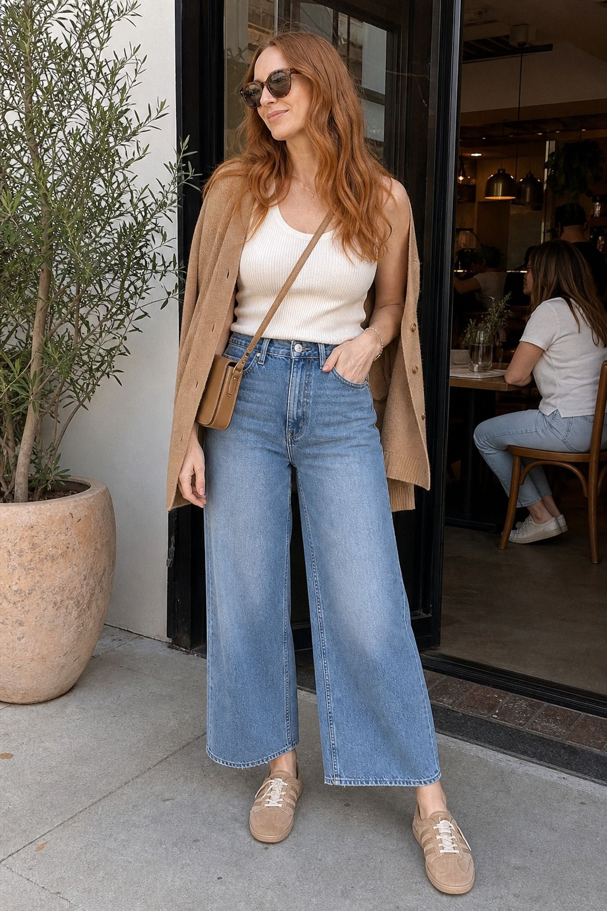 Woman wearing wide-leg jeans with a ribbed tank