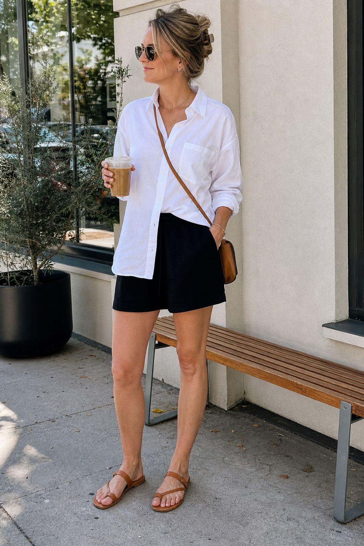 Woman wearing soft shorts with a poplin shirt
