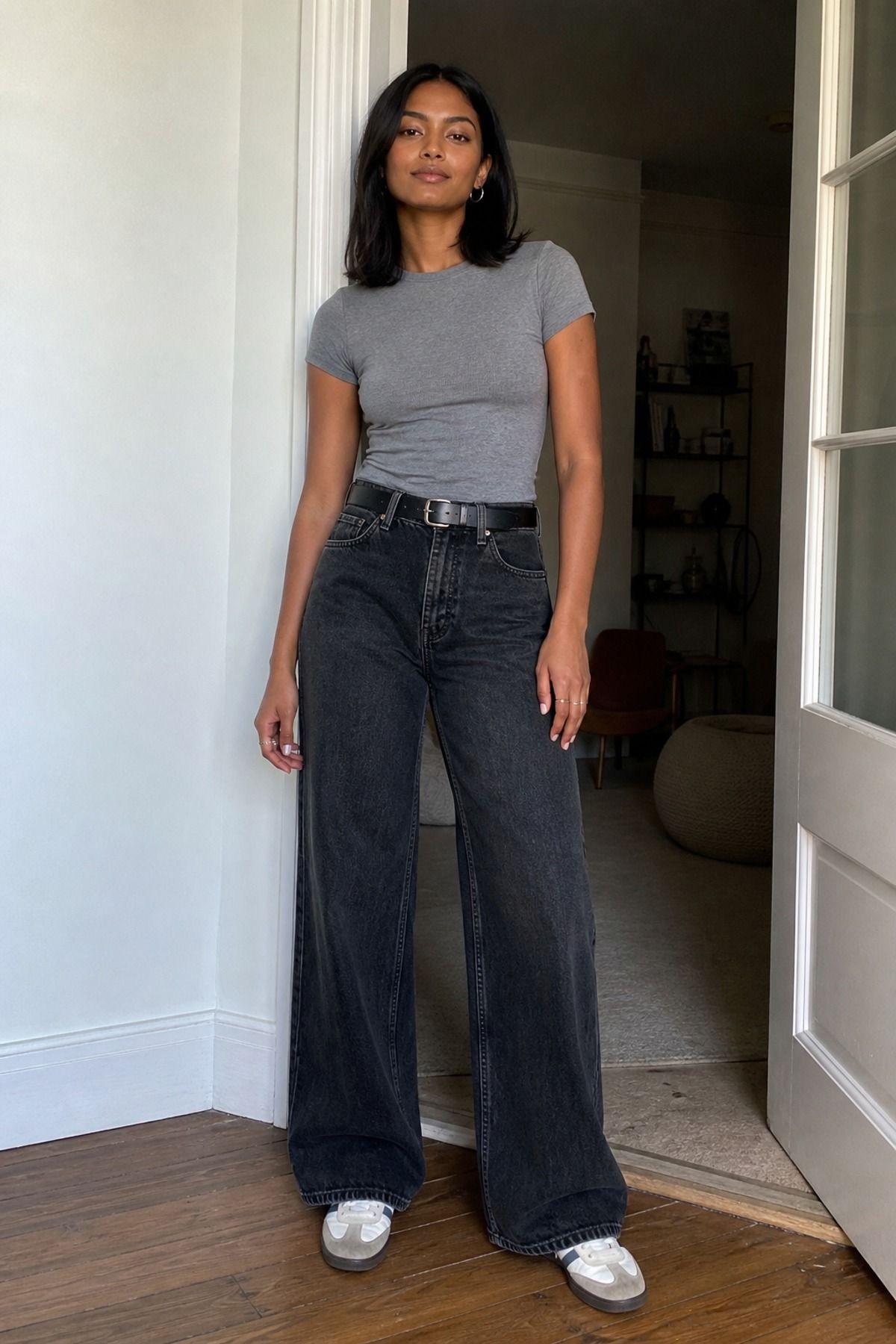 Woman wearing wide leg jeans with a slim tee