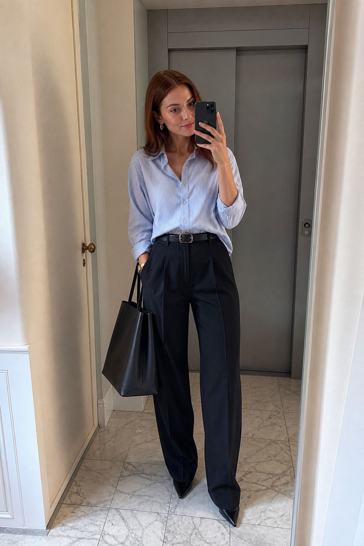 Woman wearing black trousers with a button down