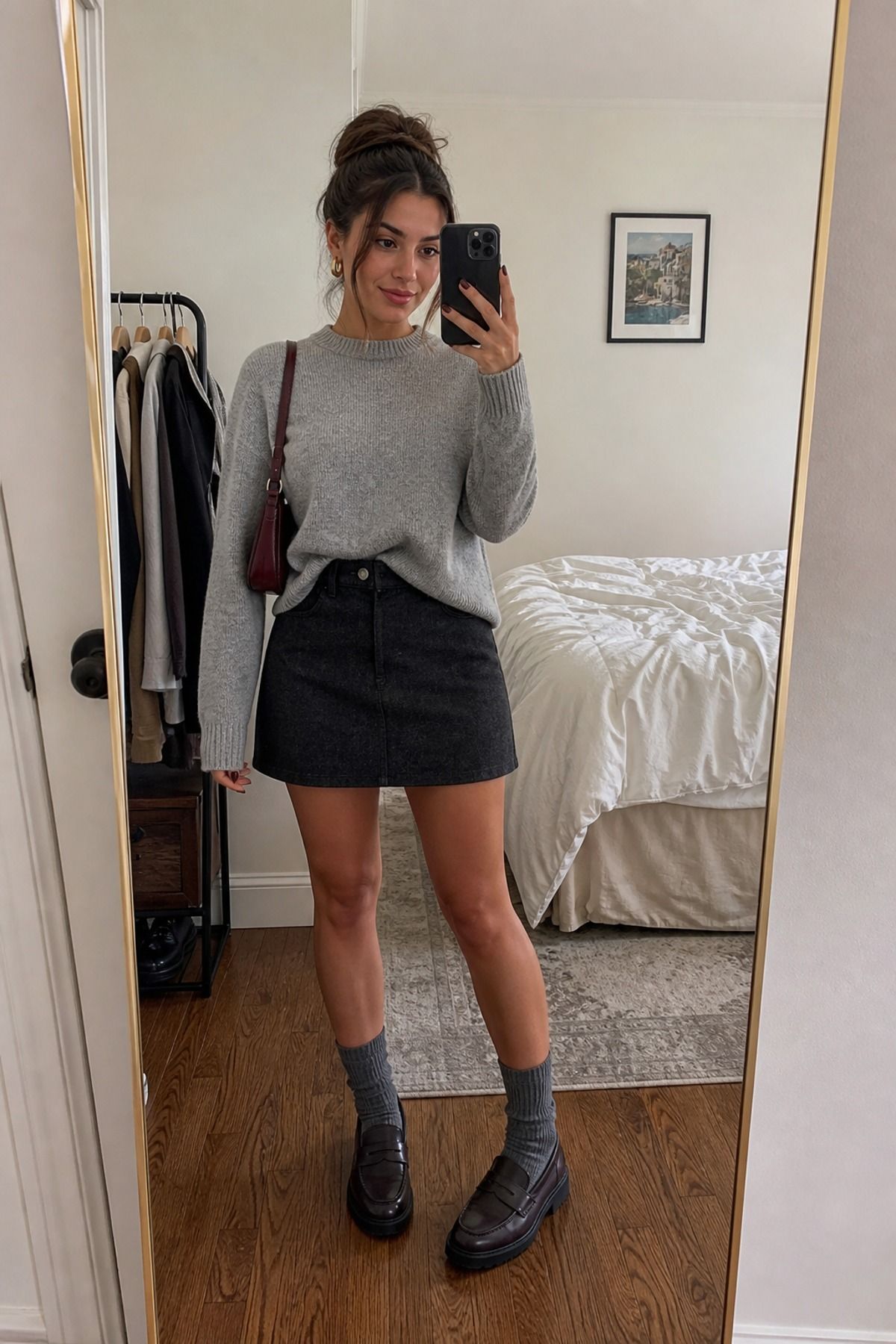 Woman wearing a mini skirt with a crewneck sweater