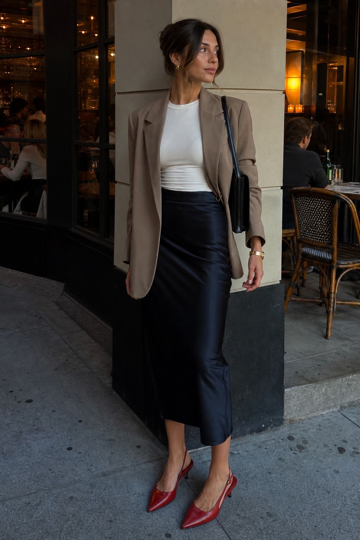 Woman wearing a satin skirt with a blazer