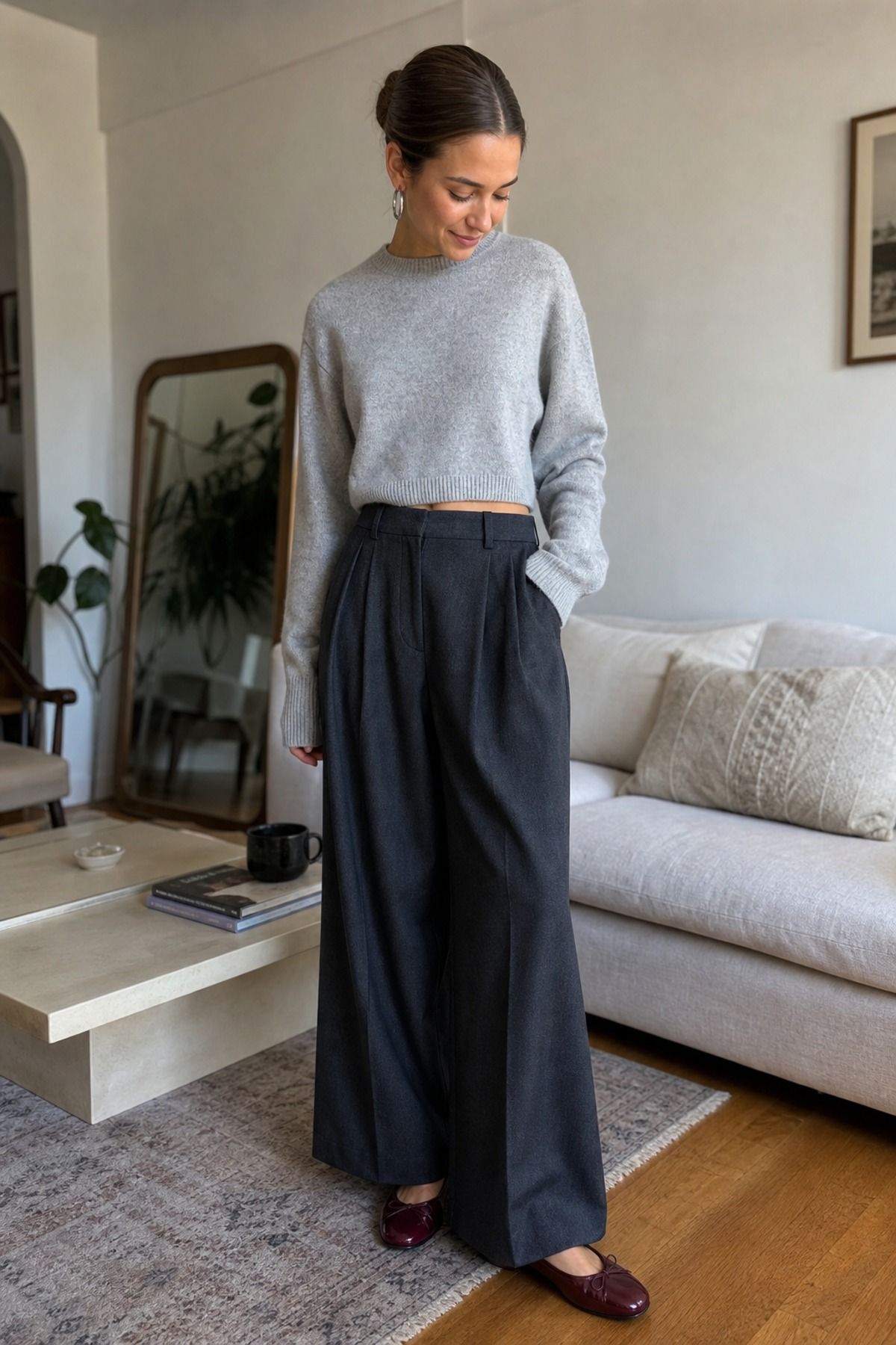 Woman wearing wide leg pants with a sweater