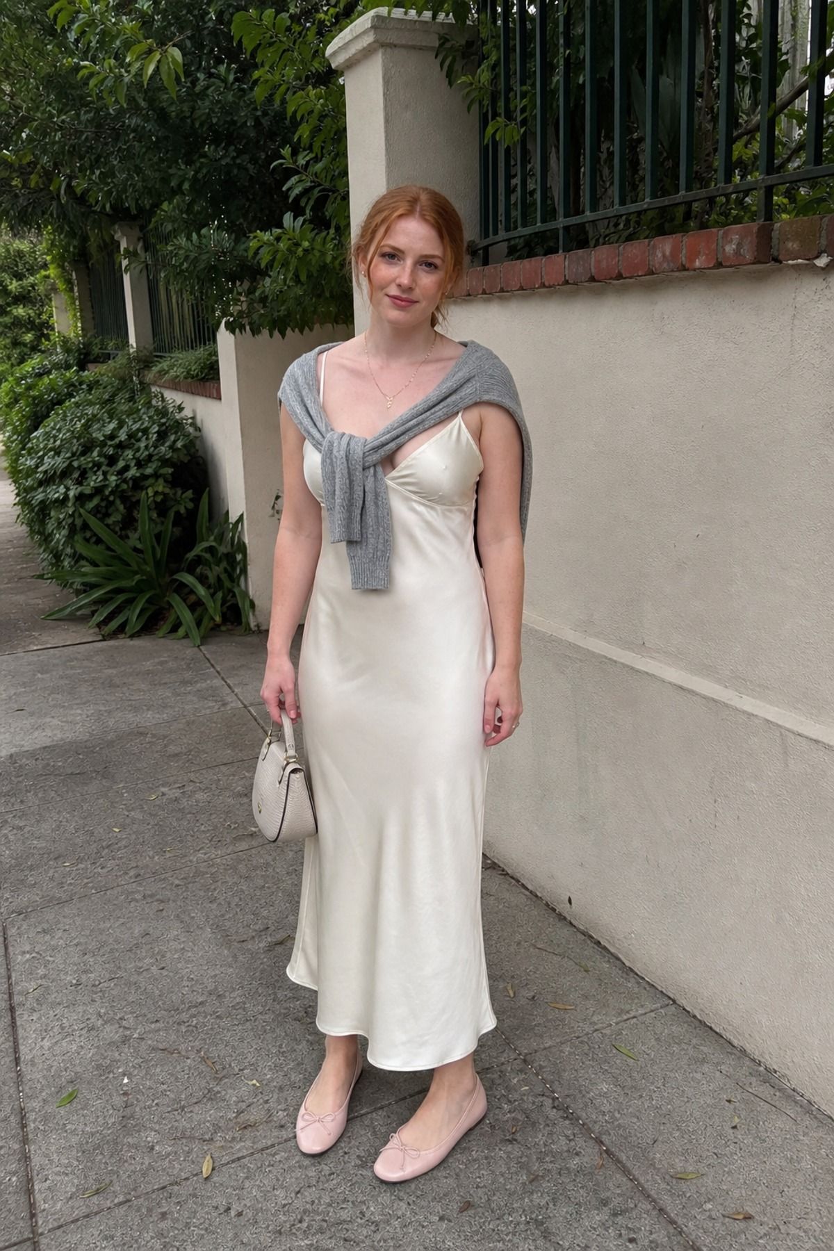 Woman wearing a slip dress with ballet flats