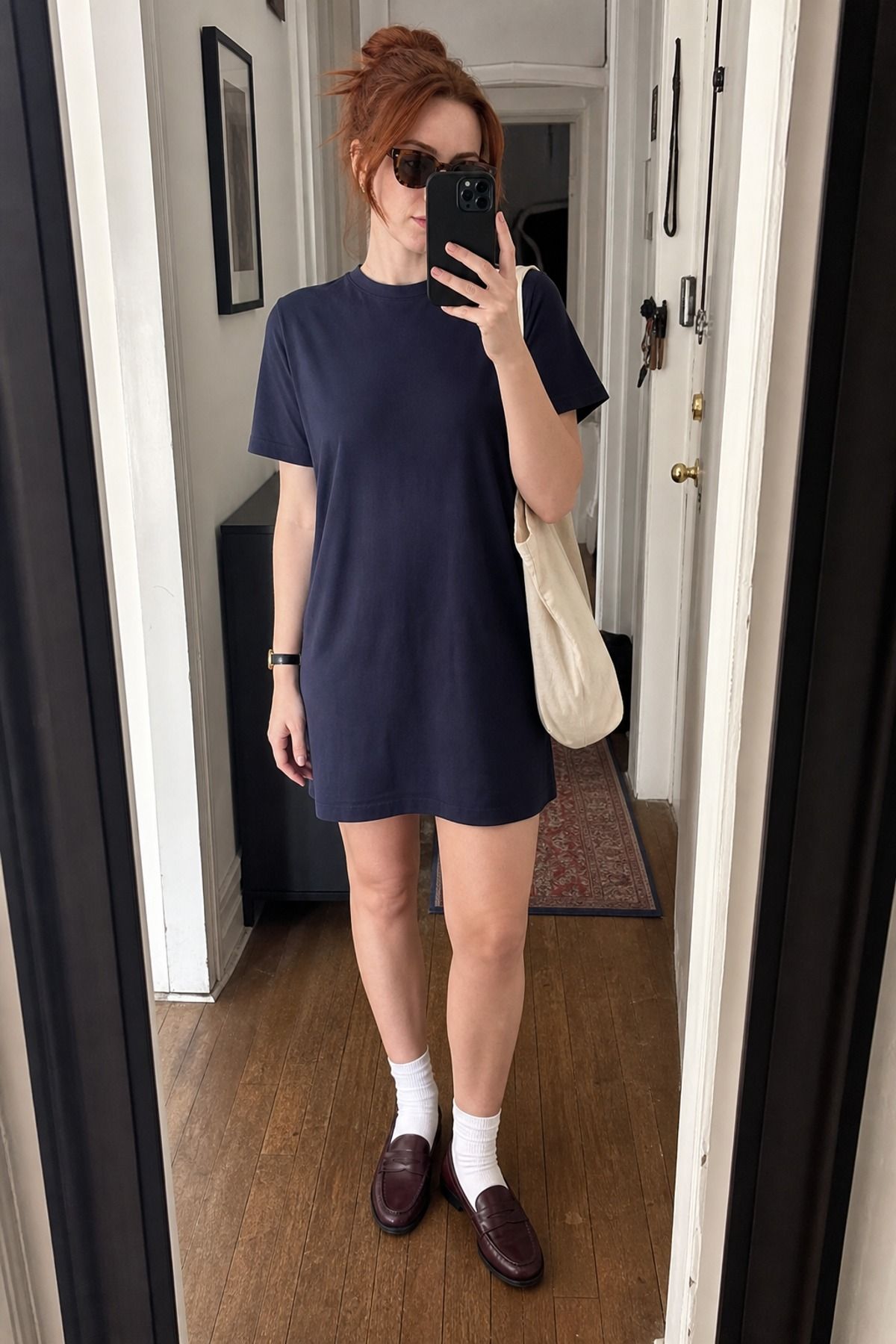 Woman wearing a t-shirt dress with loafers