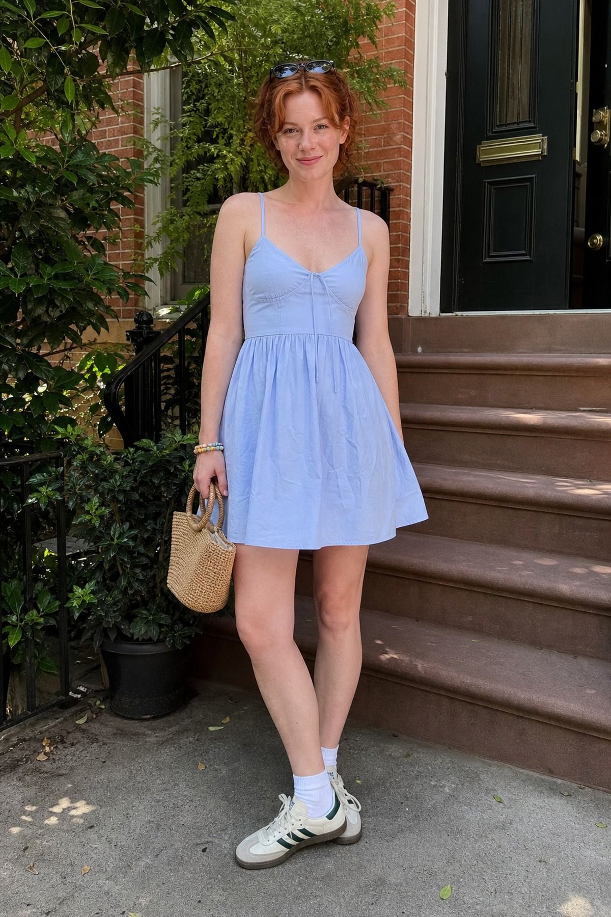 Woman wearing a summer dress with Adidas Sambas