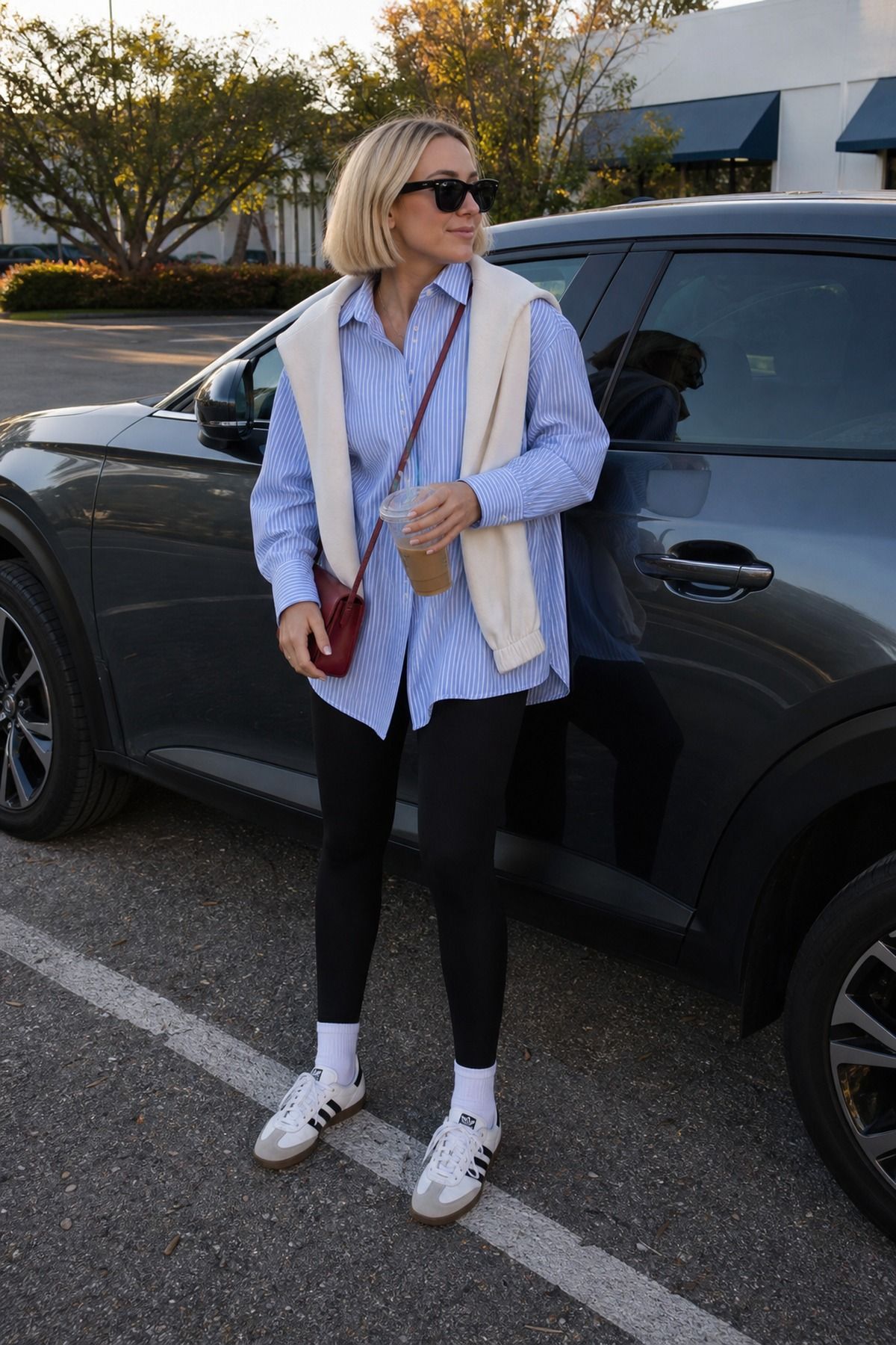 Woman wearing leggings with Adidas Sambas