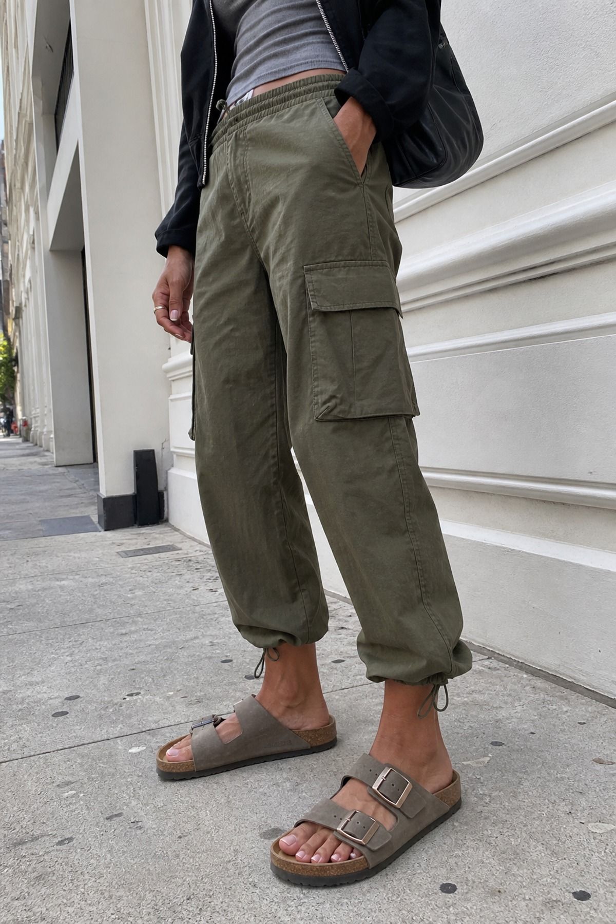 Woman wearing cargo pants with Birkenstocks