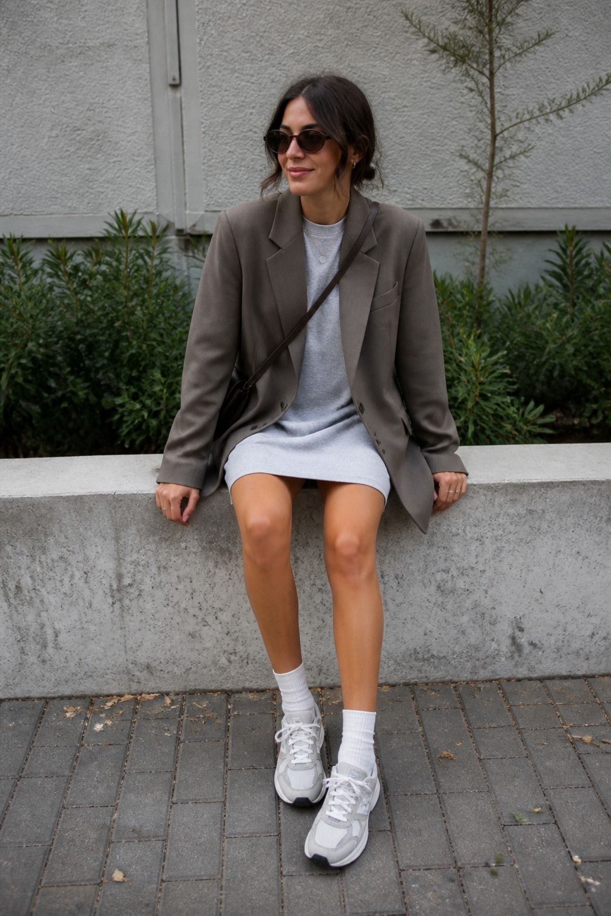 Woman wearing a blazer with a t-shirt dress