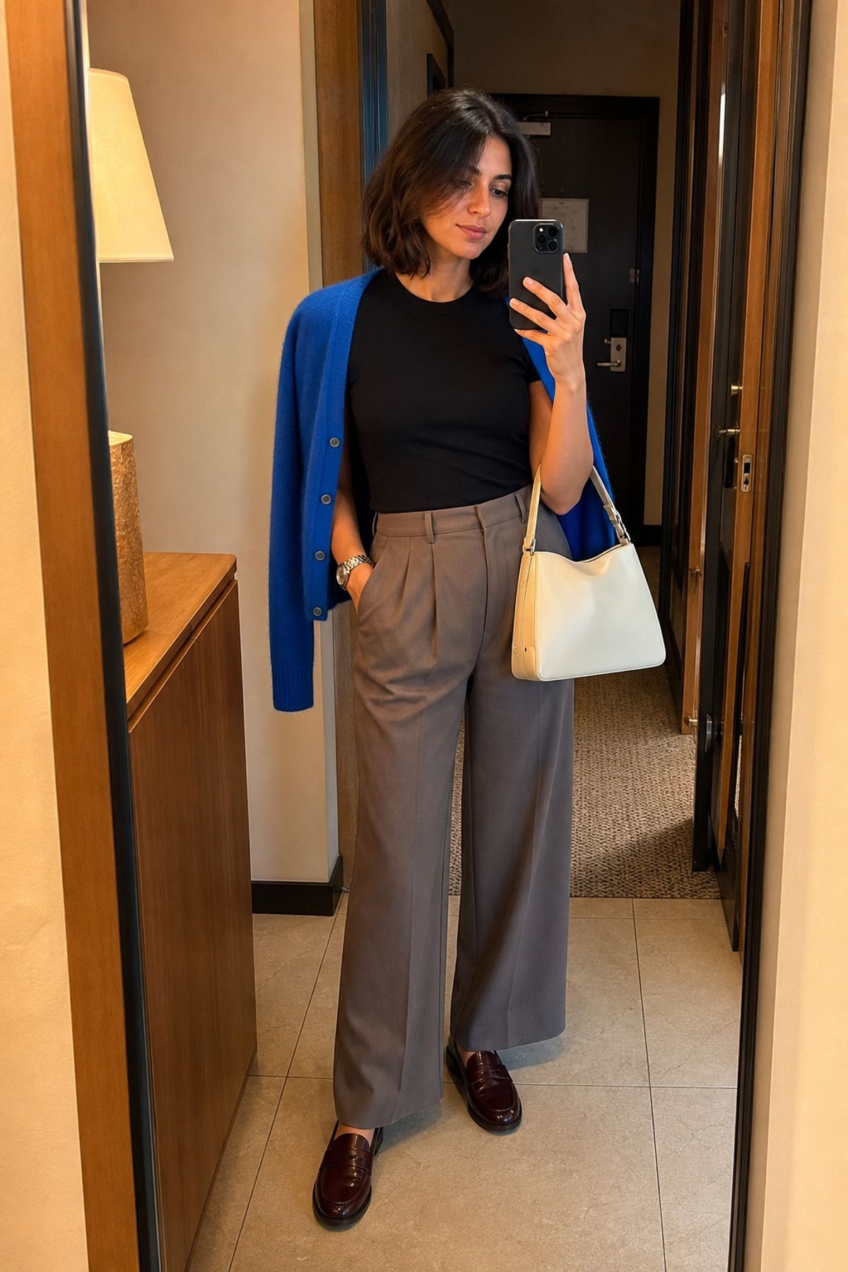 Woman wearing wide-leg trousers with loafers