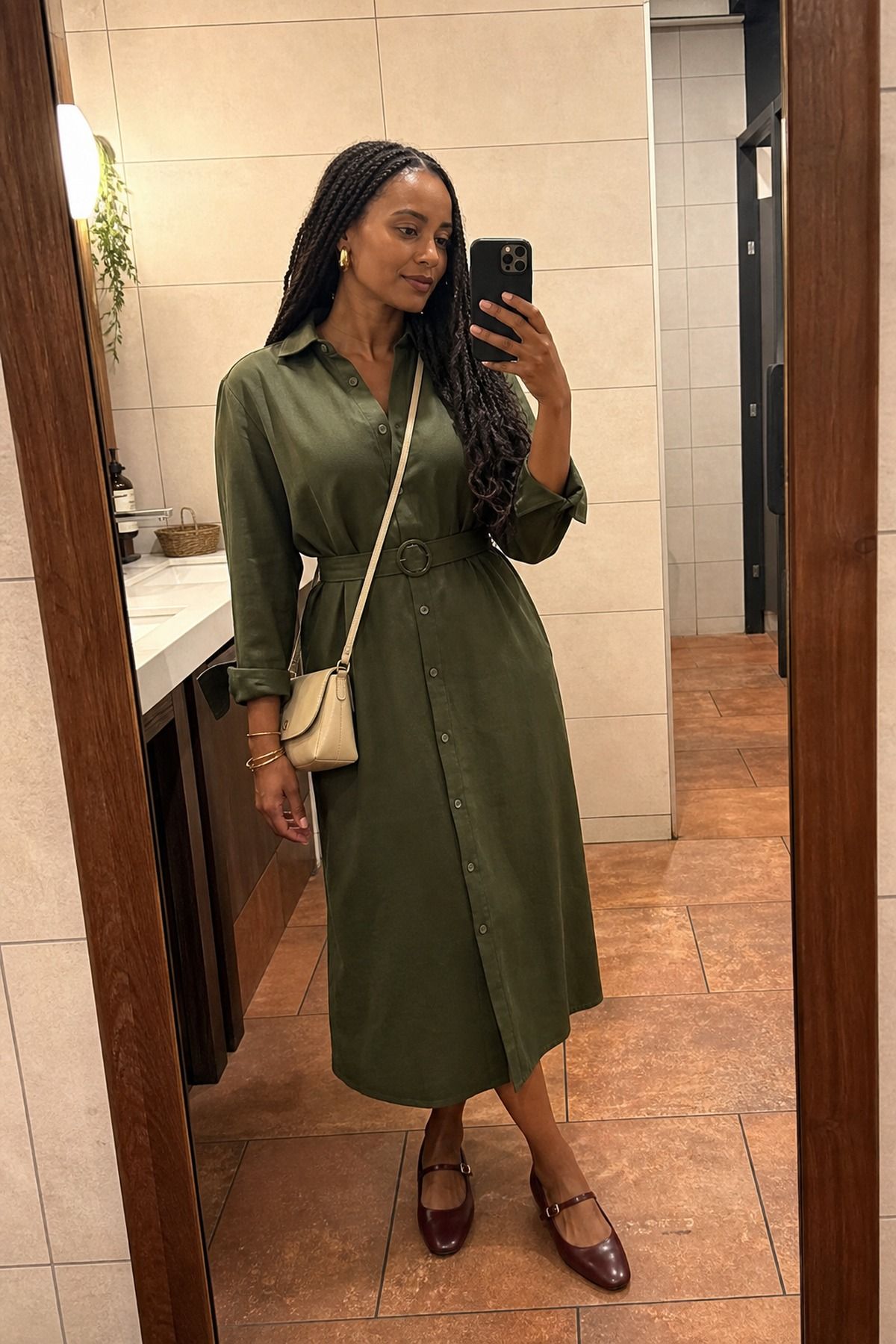 Woman wearing a button-down dress with Mary Janes