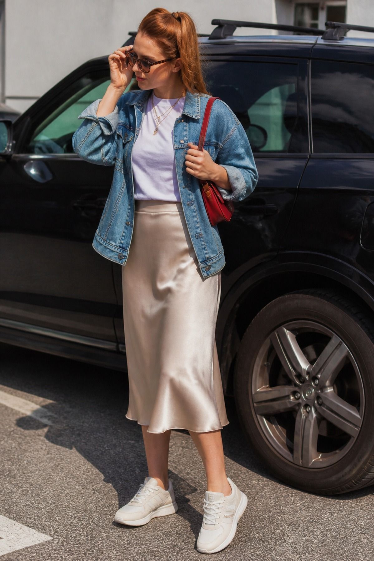 Woman wearing a slip skirt with sneakers