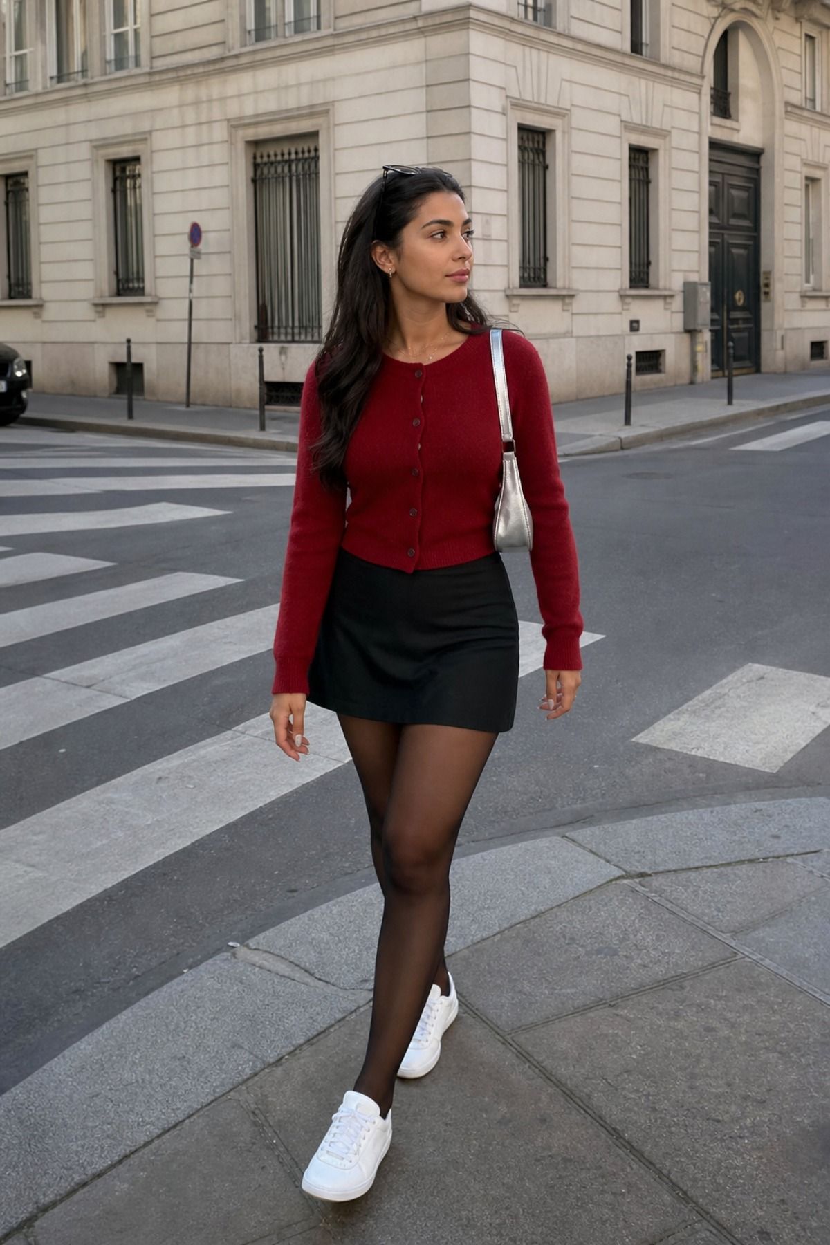 Woman wearing a mini skirt with white sneakers