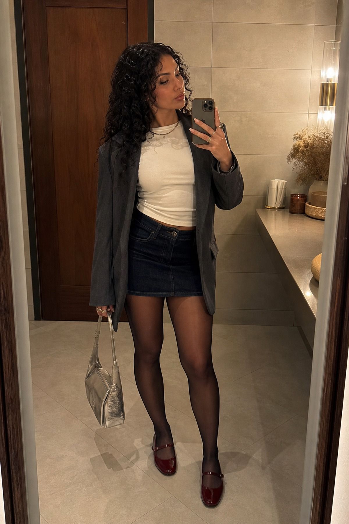 Woman wearing a white T-shirt with a mini skirt