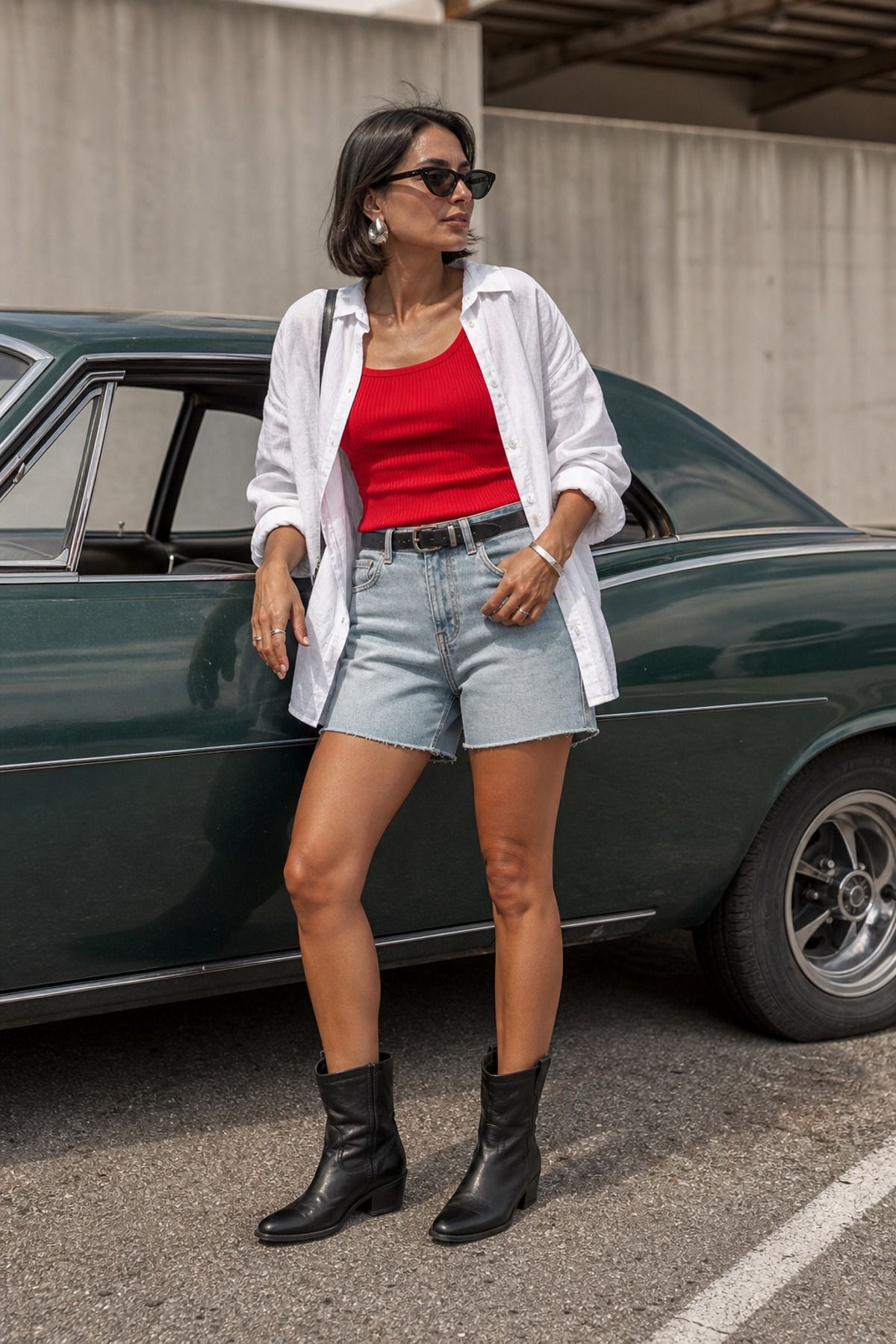 Woman wearing denim shorts with ankle boots