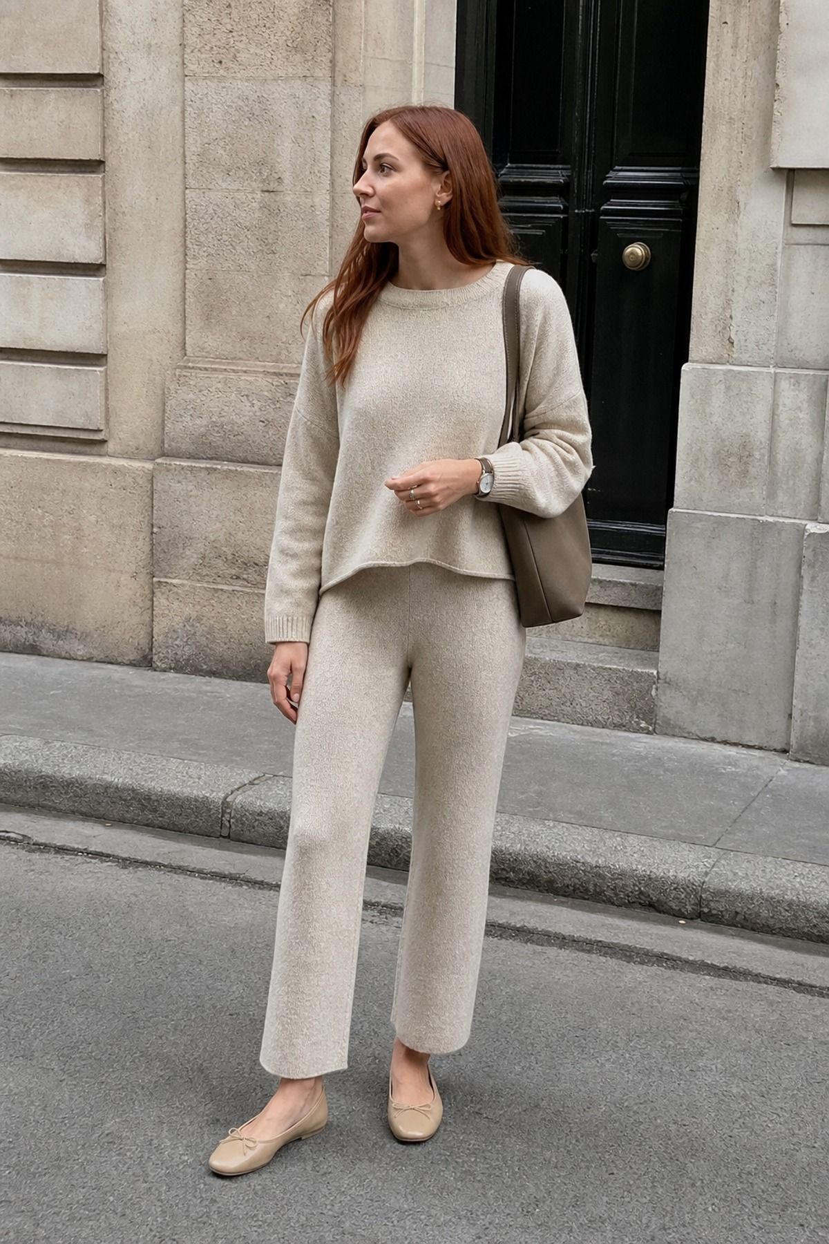 Woman wearing a monochrome knit set with flats, a minimalist outfit