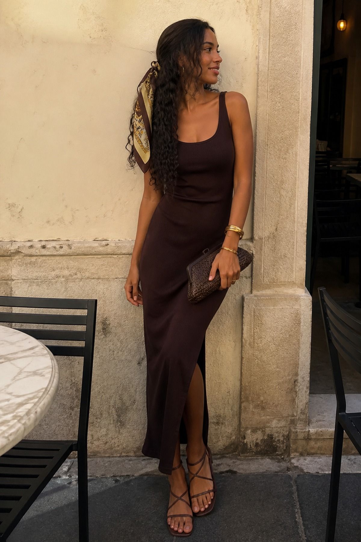 Woman wearing a summer silk scarf with a tank dress