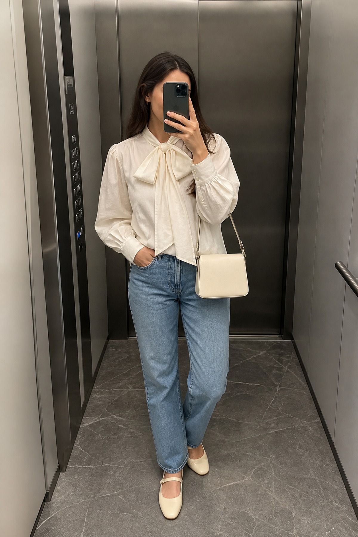 Woman wearing a bow blouse with relaxed jeans, a soft girl outfit
