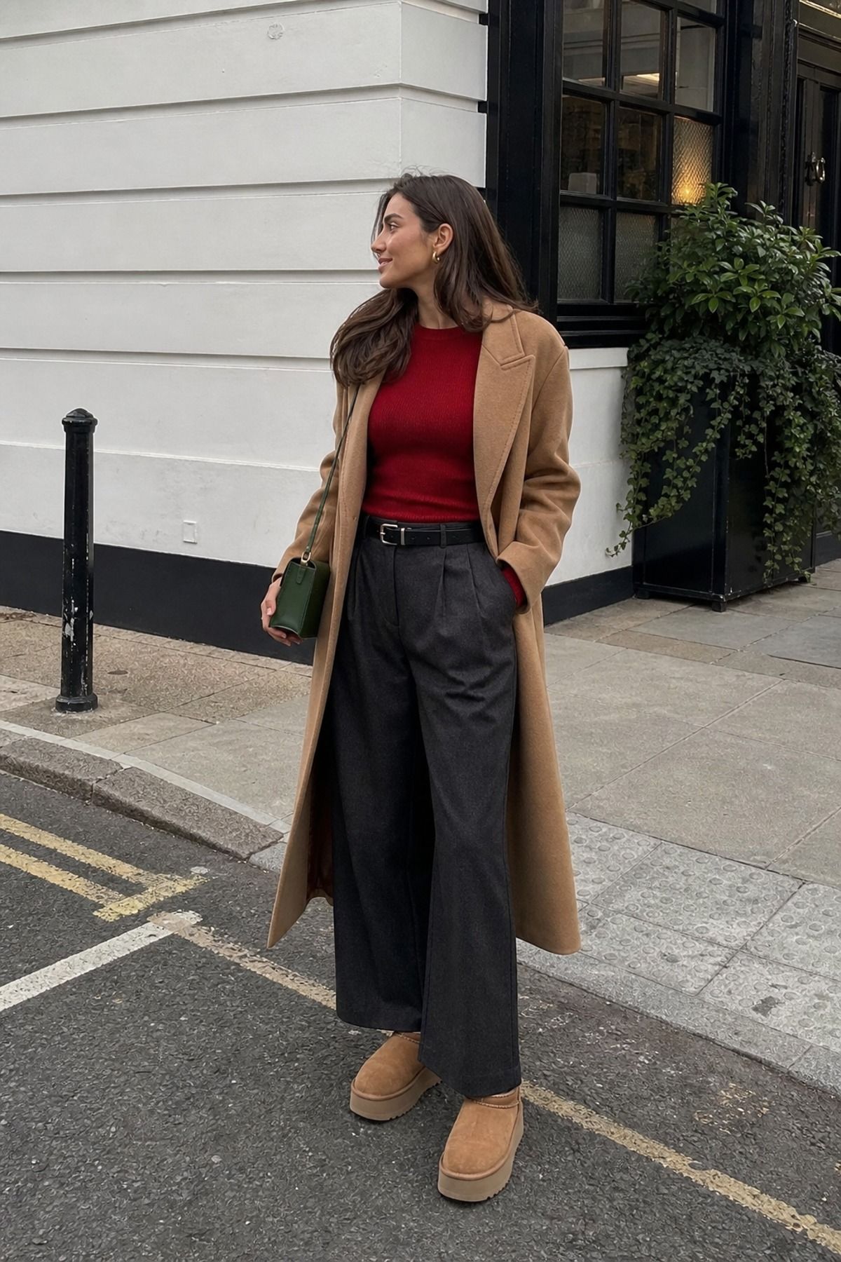 Woman wearing wide-leg trousers with Uggs