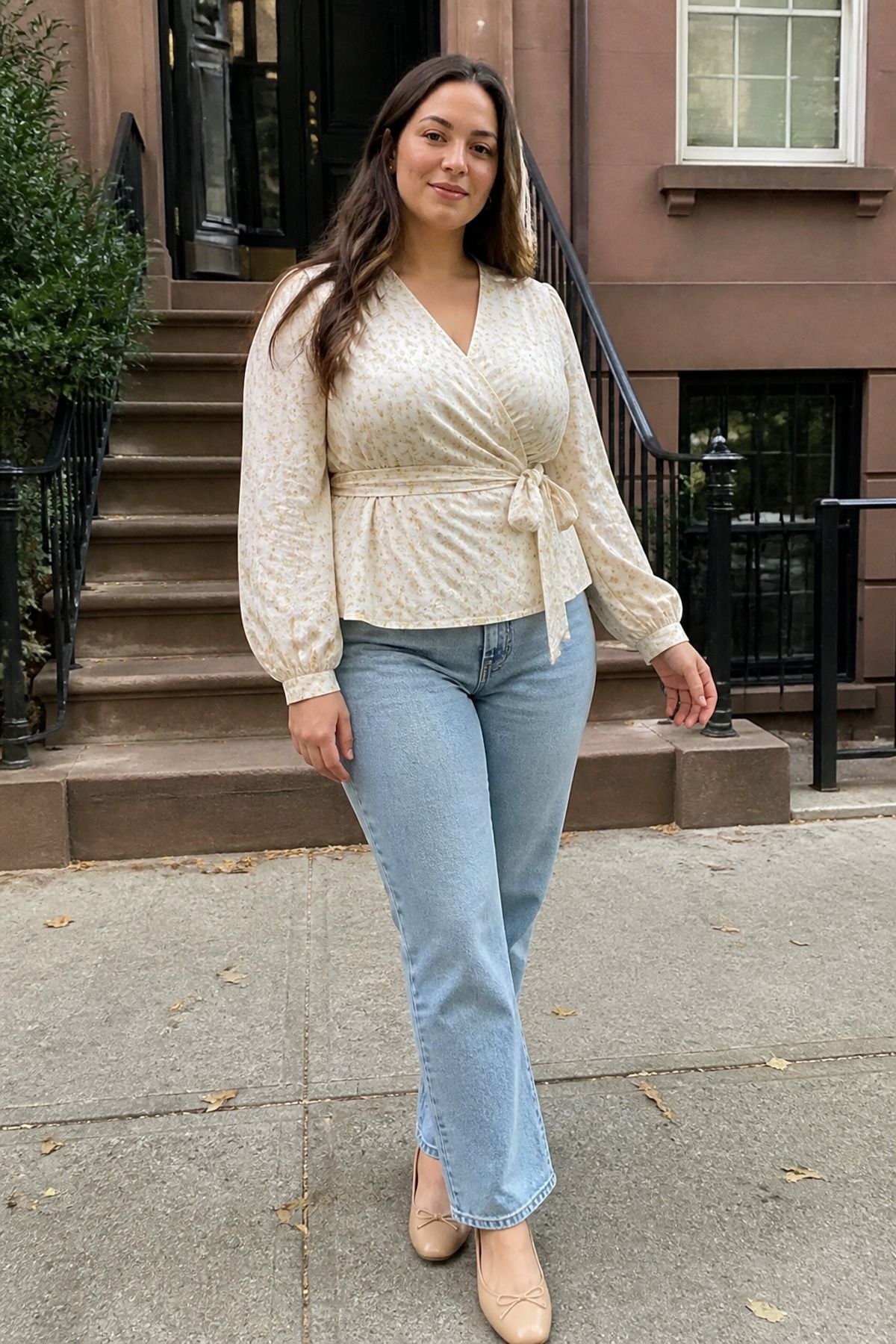 Woman wearing a wrap top with straight jeans