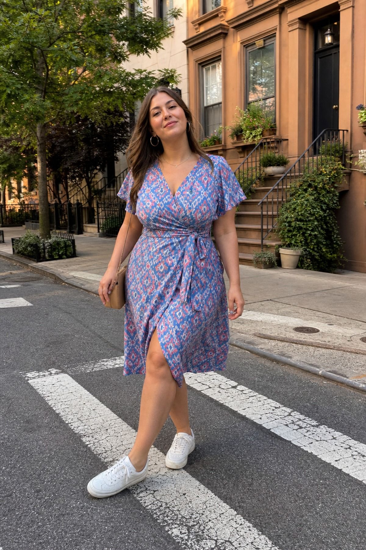 Woman wearing a wrap dress with sneakers