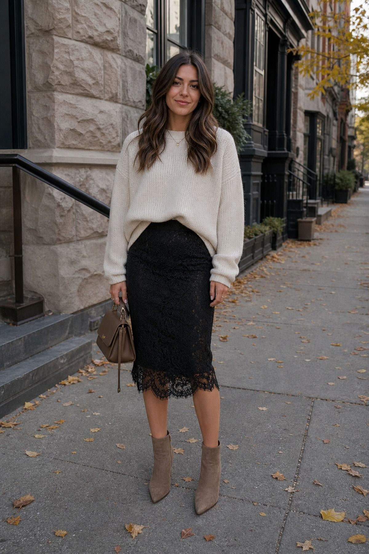 Woman wearing a lace pencil skirt with a relaxed sweater