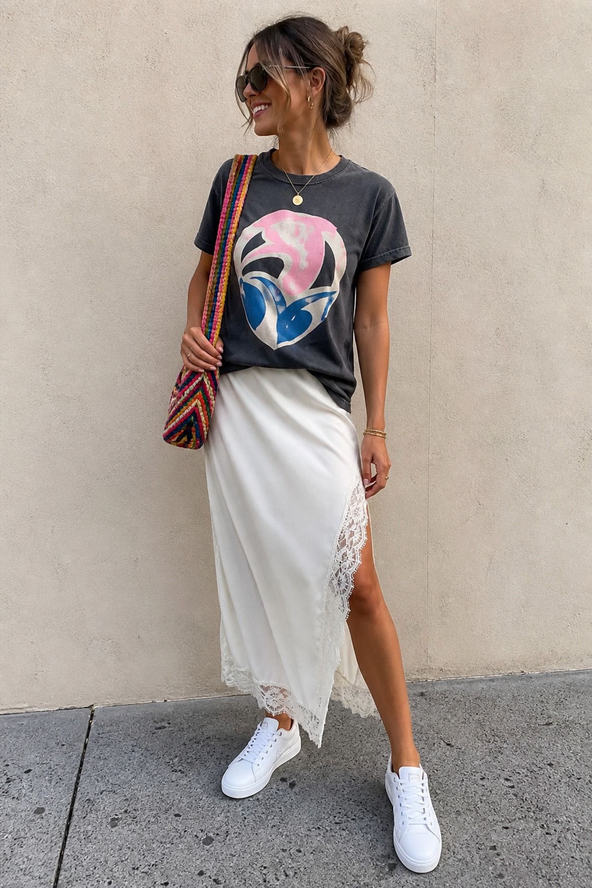 Woman wearing a lace trim skirt with a graphic tee