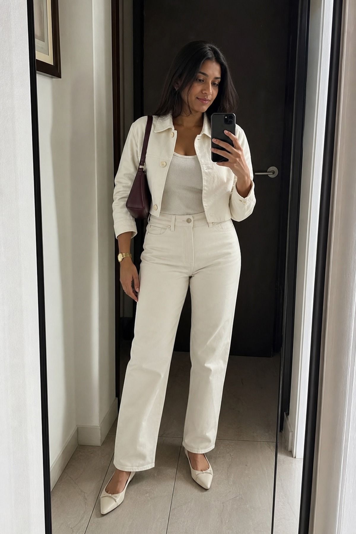 Woman wearing a monochrome tank and pants with a short jacket, a petite casual outfit