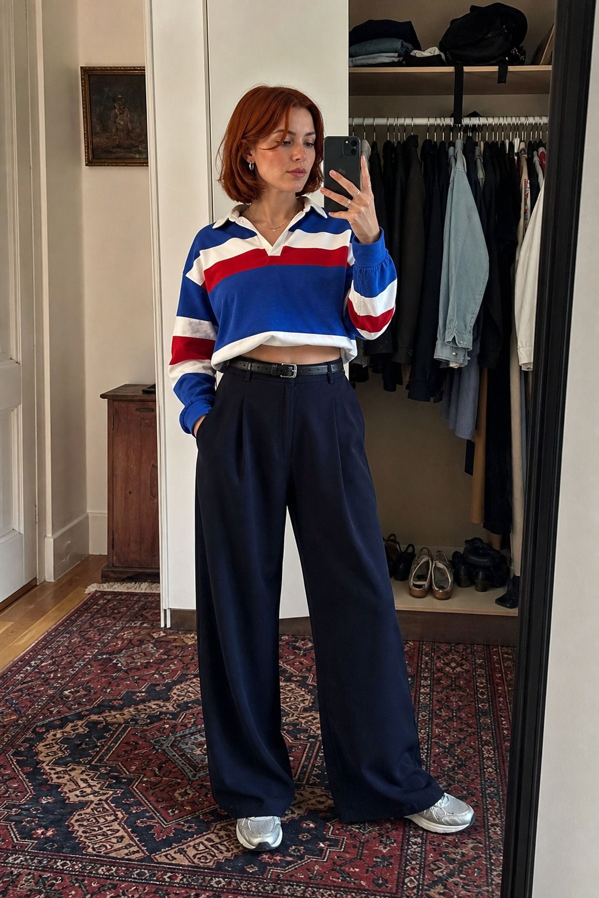 Woman wearing a cropped rugby shirt with wide-leg trousers, a tall girl casual outfit