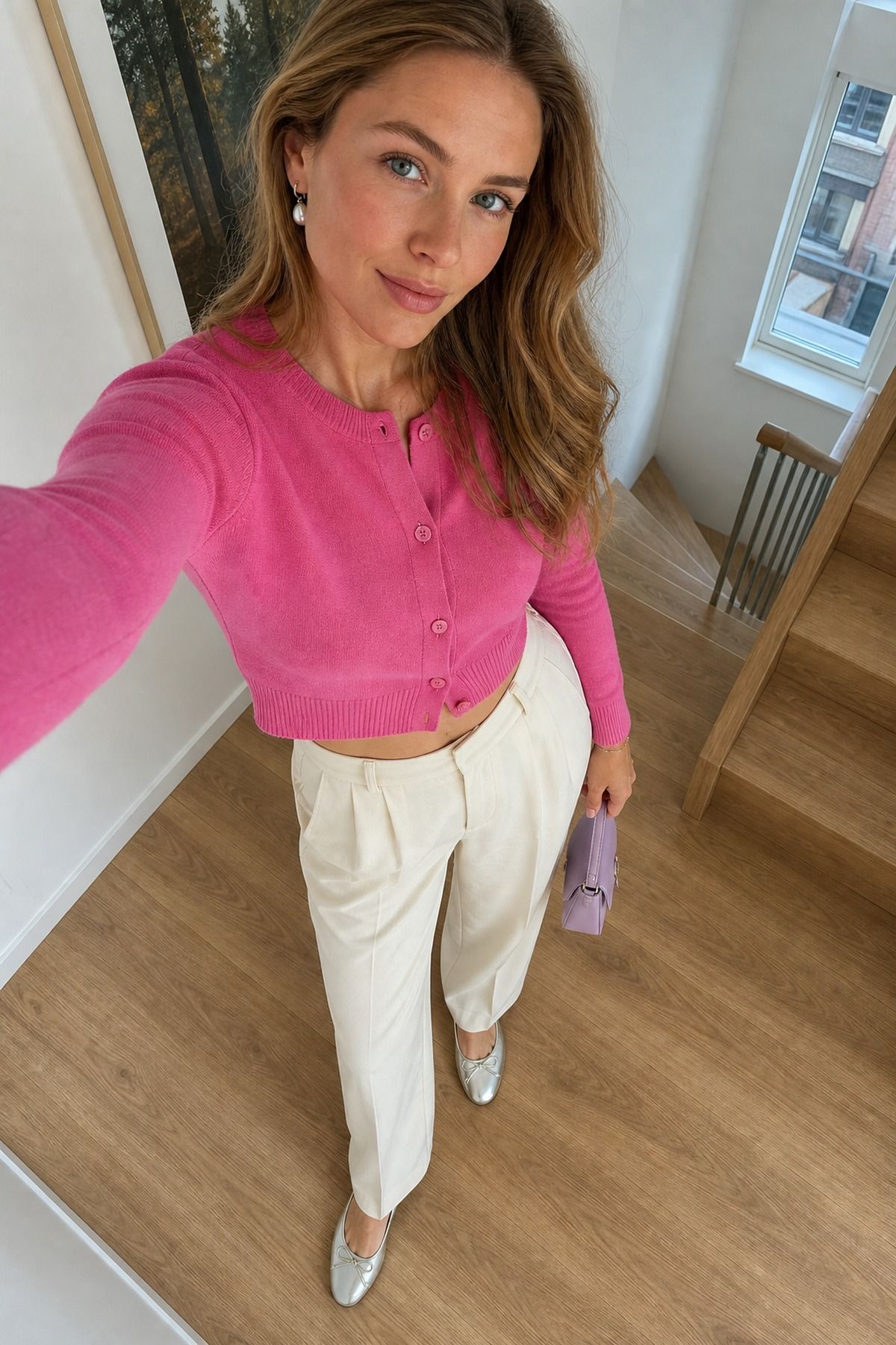 Woman wearing a cropped cardigan with high-rise trousers, a tall girl casual outfit