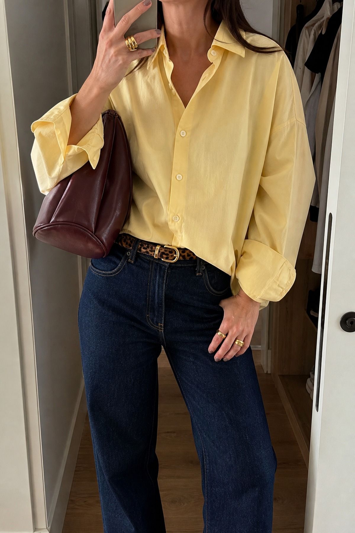 Woman wearing an oversized shirt with full-length jeans, a tall girl casual outfit