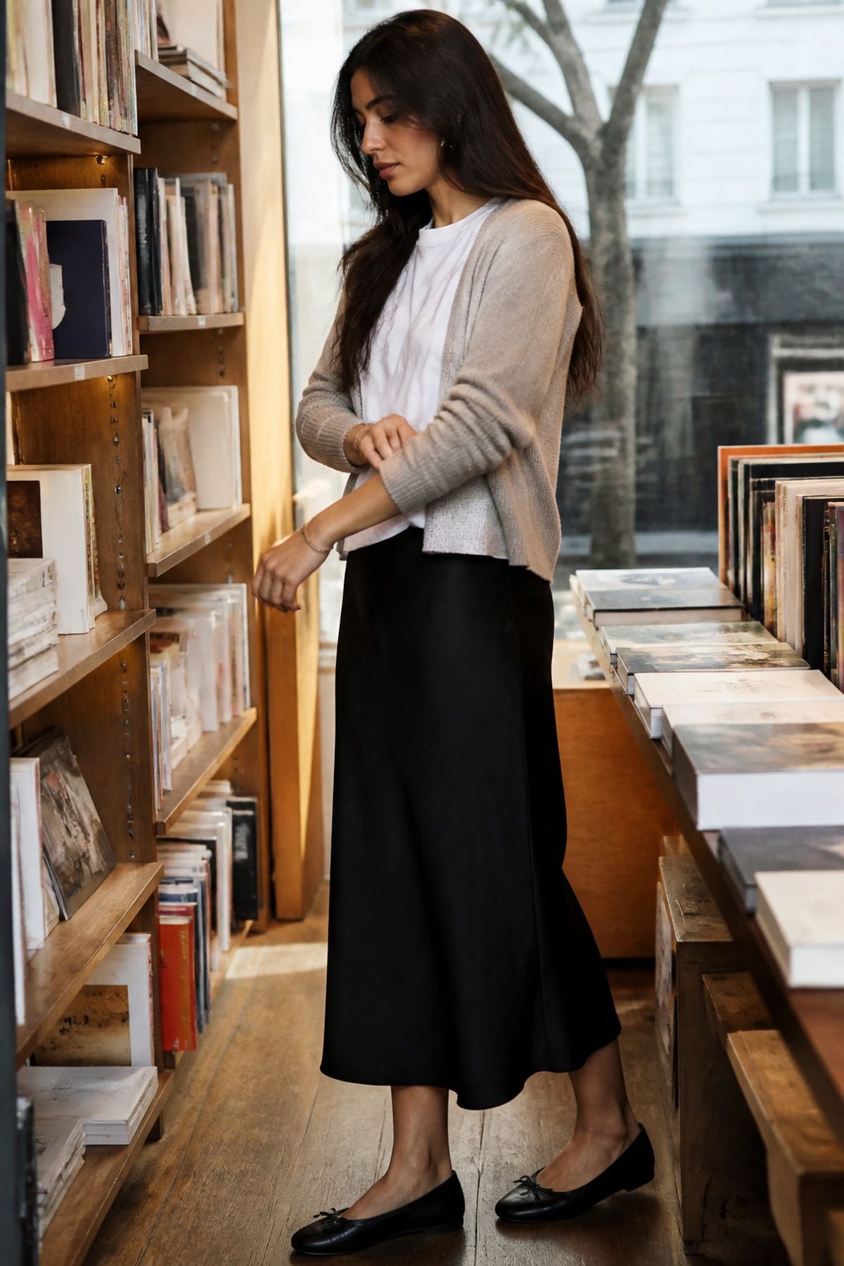 Woman wearing a black slip skirt with a white tee, a casual Valentine s day outfit