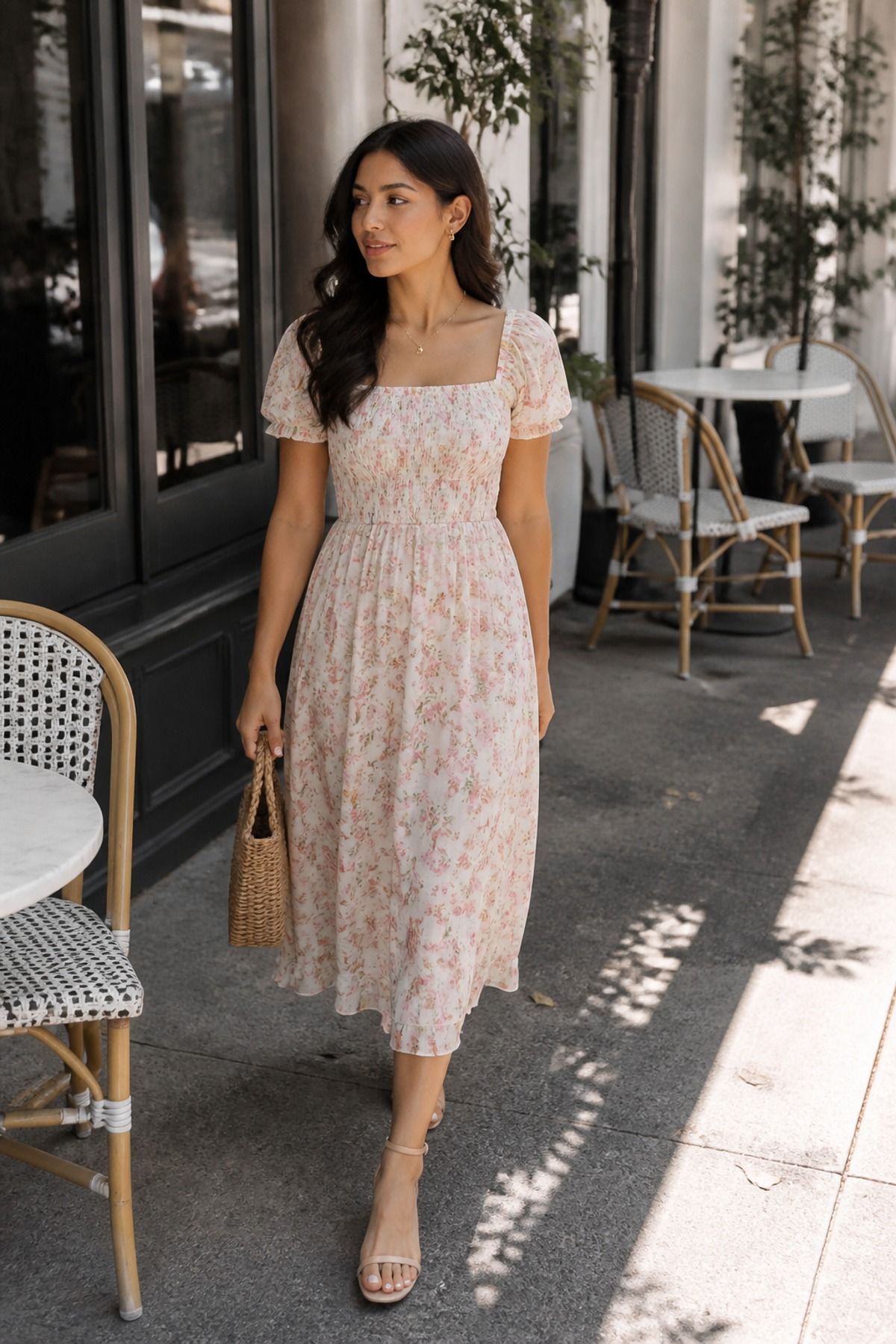 Woman wearing a floral midi dress with low block heels, a mother s day outfit