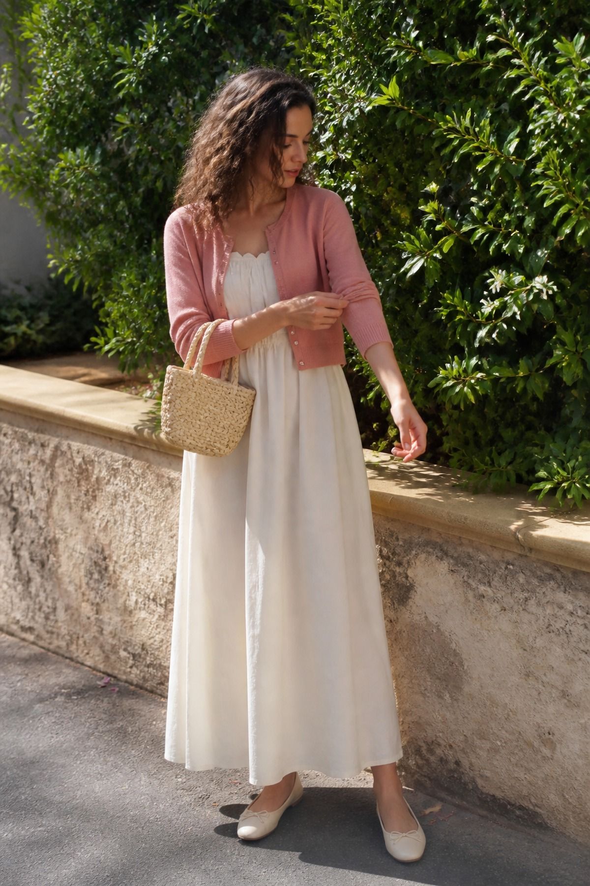 Woman wearing a cotton maxi dress with a cropped cardigan, a mother s day outfit