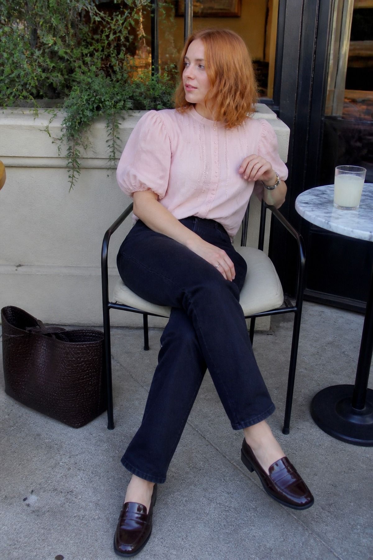 elevated jeans with a puff sleeve blouse baby shower guest outfit