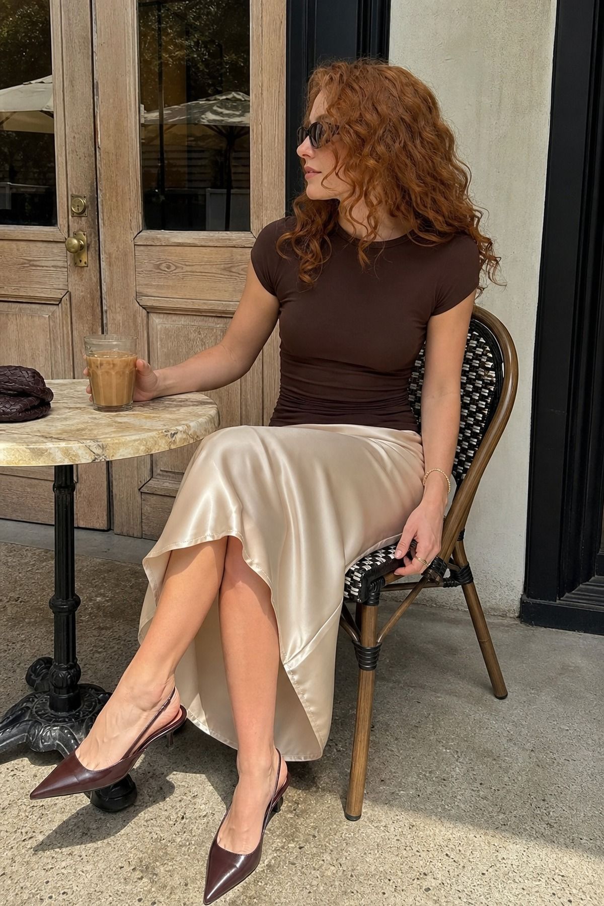 satin midi skirt with a fitted tee baby shower guest outfit