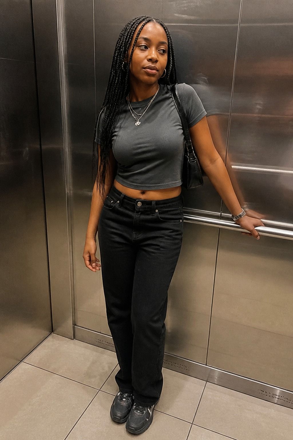 black straight jeans styled in a casual denim outfit