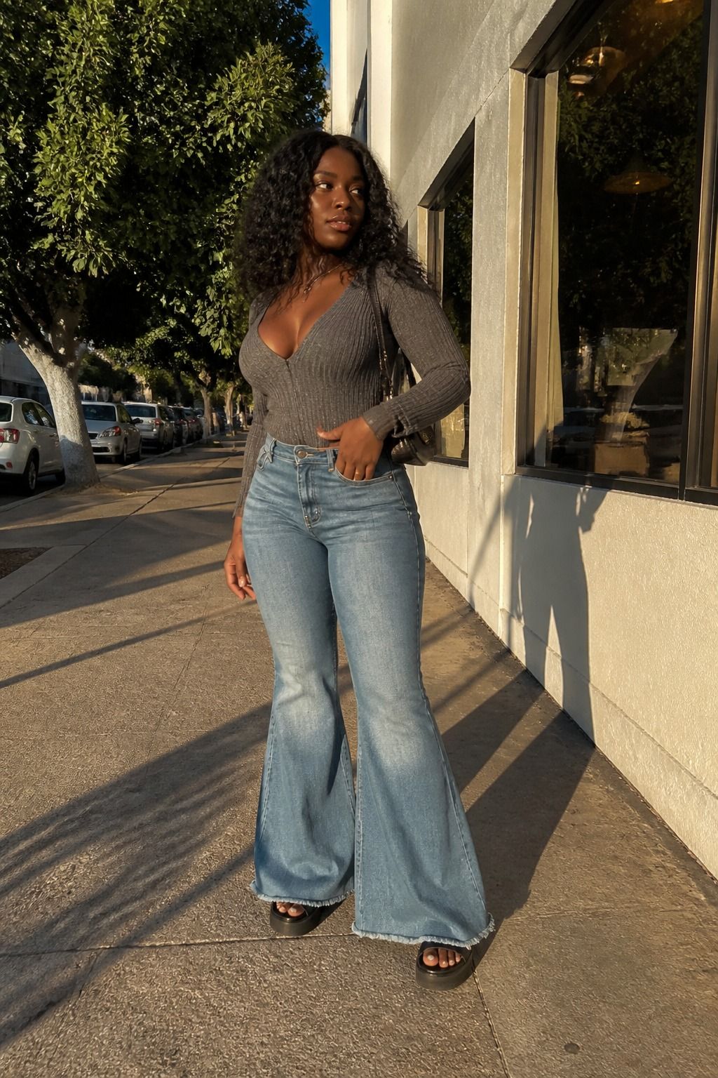 flare jeans styled in a casual denim outfit